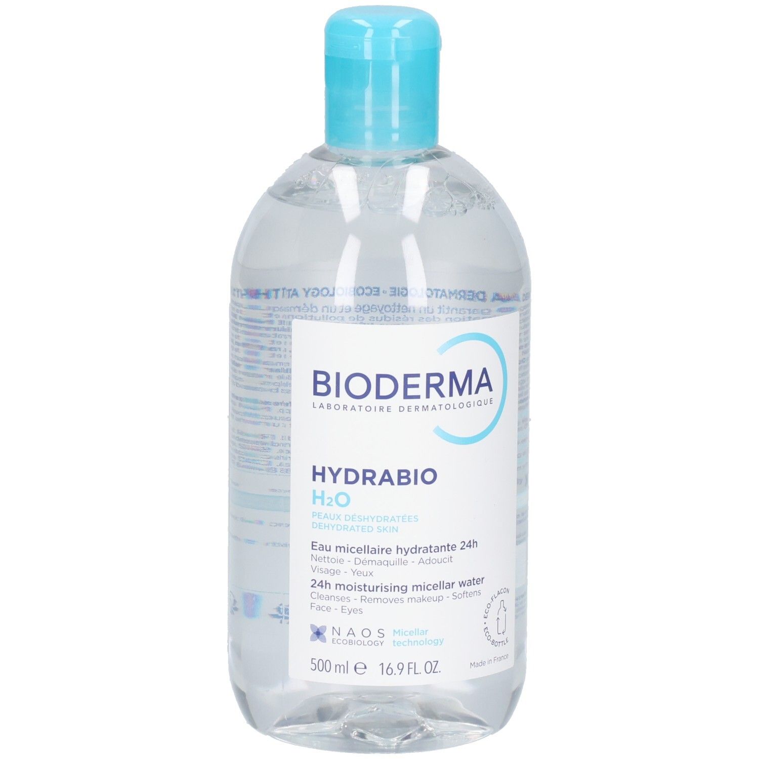 Liquide clair en bouteille avec bouchon bleu. Inscription: BIODERMA, HYDRABIO H2O. 500ml.
