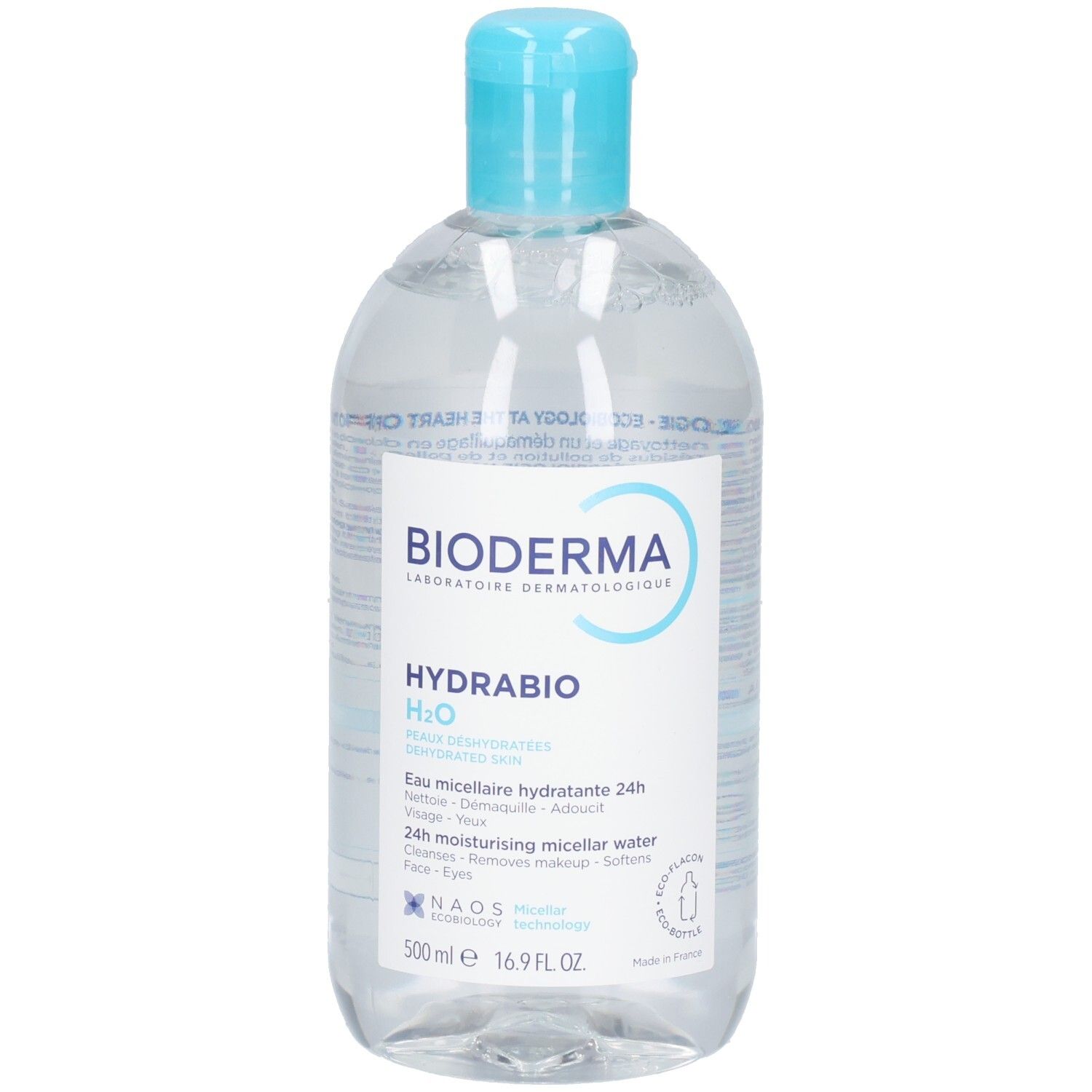 Liquide clair en bouteille avec bouchon bleu. Inscription: BIODERMA, HYDRABIO H2O. 500ml.