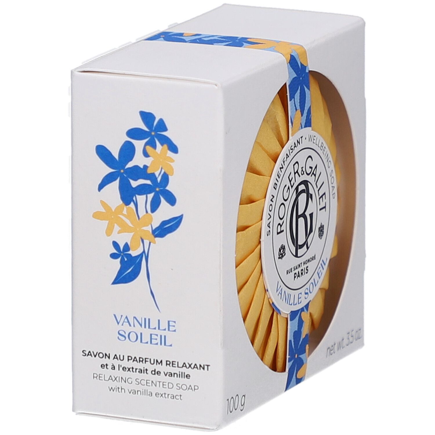 Emballage avec savon rond. Inscription: Vanille Soleil. Motif floral. Boîte blanche carrée.