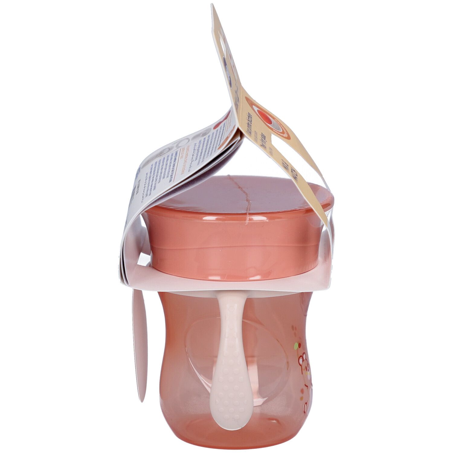 Seitenansicht des rosa Trinkbechers mit Griffen. Verpackung mit Produktinformationen.