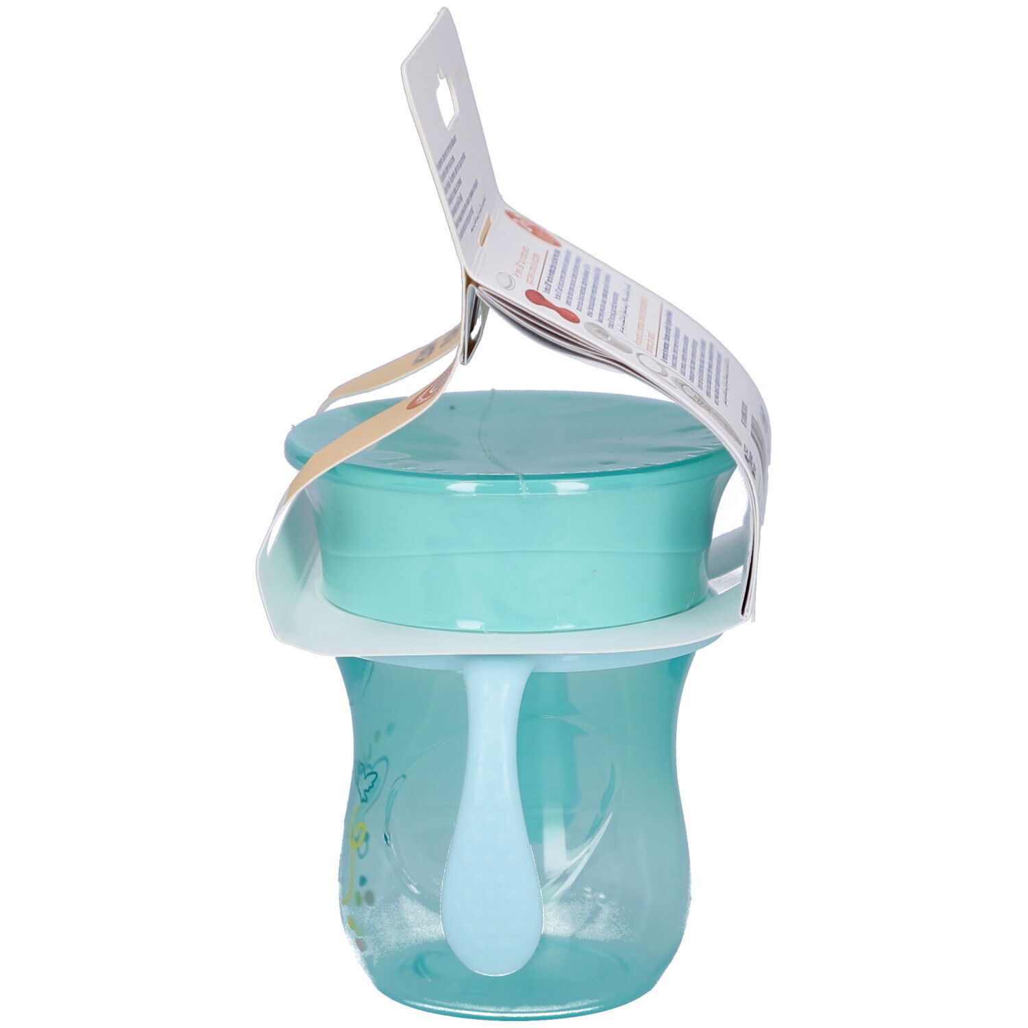 Vue latérale du gobelet d'apprentissage bleu-turquoise avec anses. Emballage avec informations sur le produit.