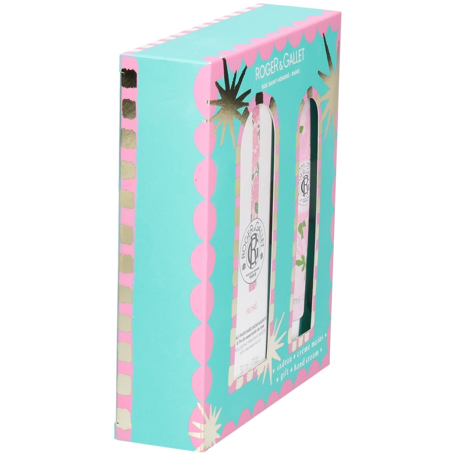 Vue latérale du coffret cadeau. Design turquoise et rose avec des étoiles. Contient une bouteille et un tube.