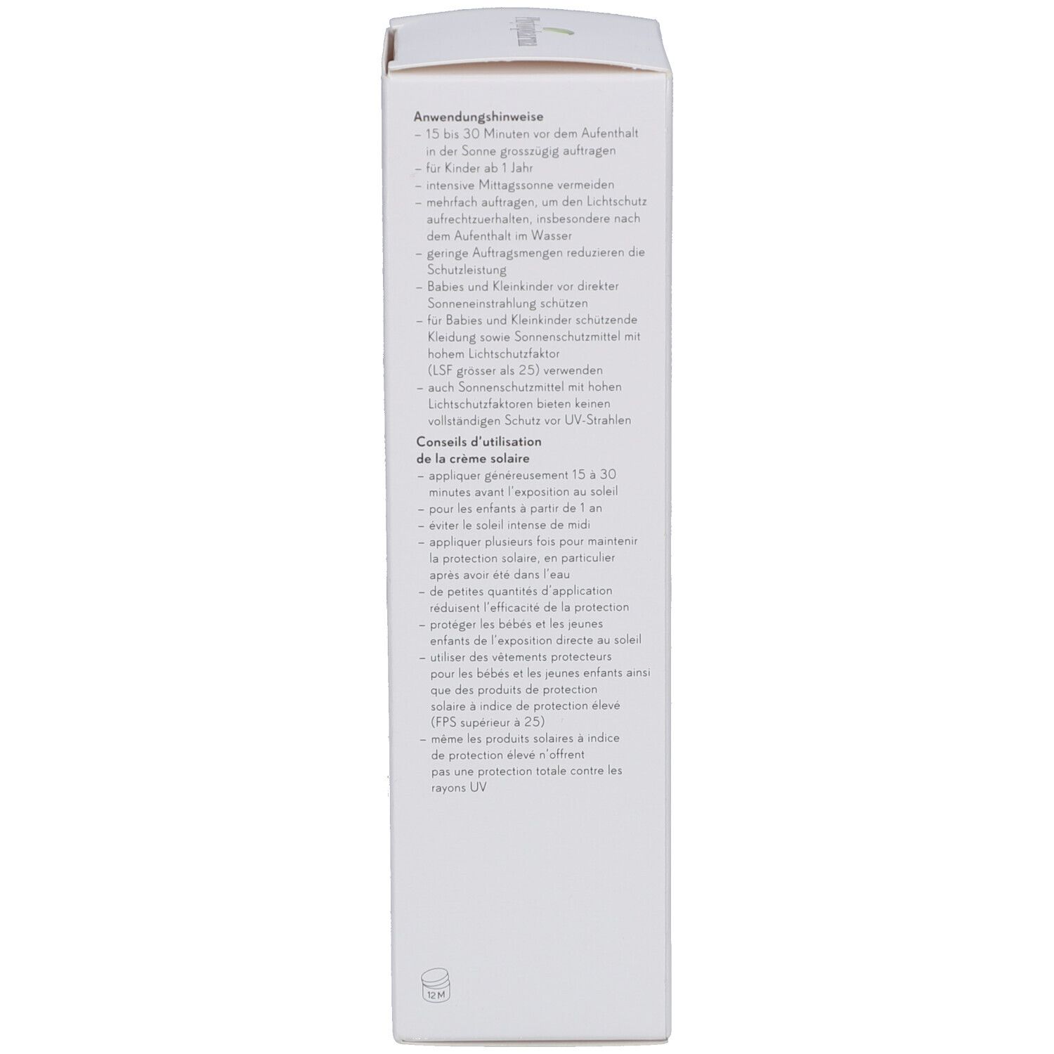 Seite des Kartons mit Sonnencreme. Text in Deutsch und Französisch. Informationen zur Anwendung.