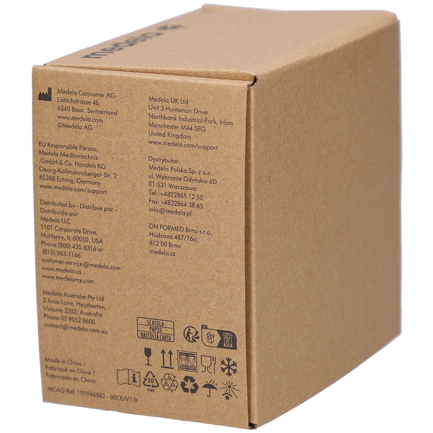 Boîte en carton marron. Logo Medela. Informations d'adresse et logos. Vue arrière.