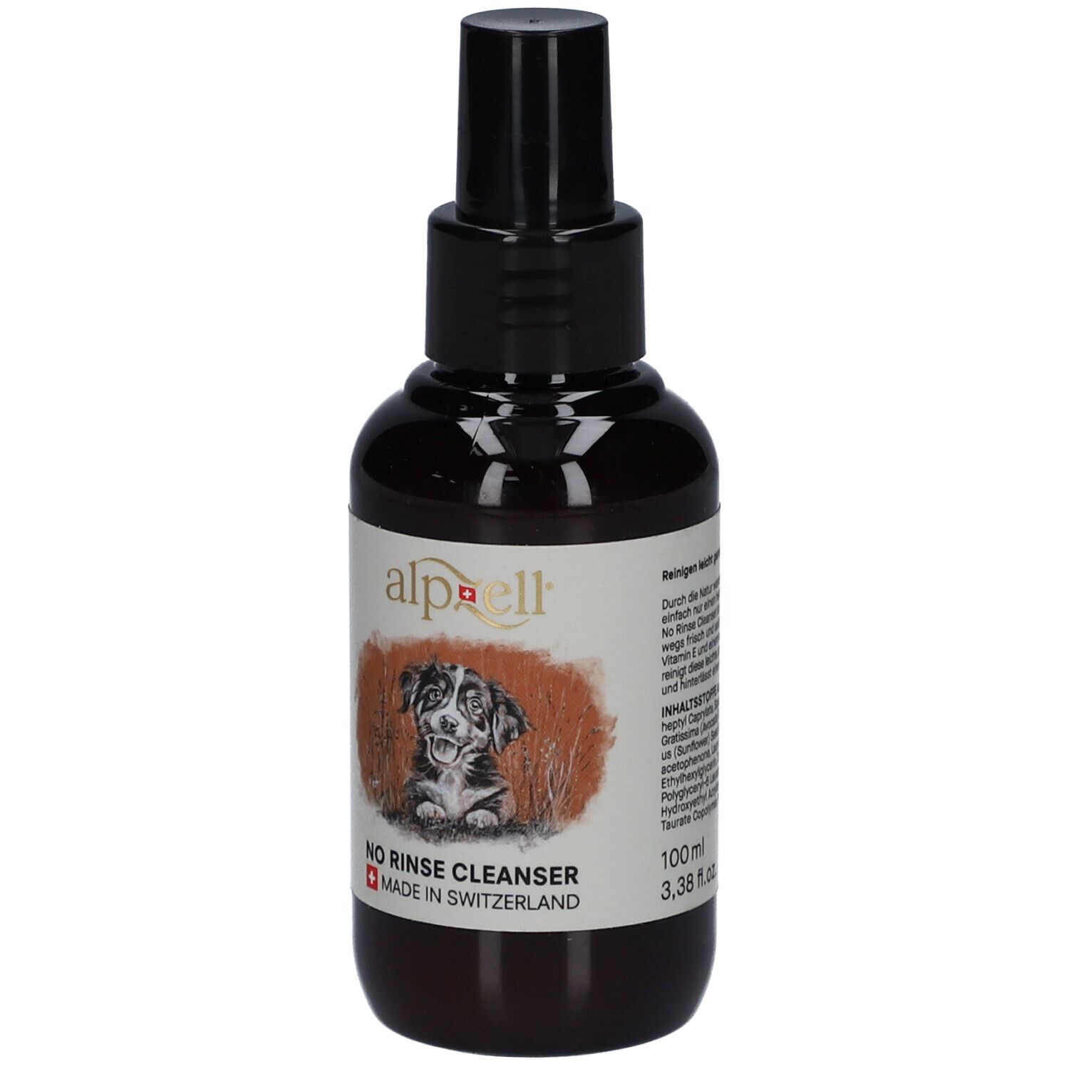 Flacon brun avec vaporisateur noir. Étiquette avec logo, chien, texte "NO RINSE CLEANSER" et "MADE IN SWITZERLAND".