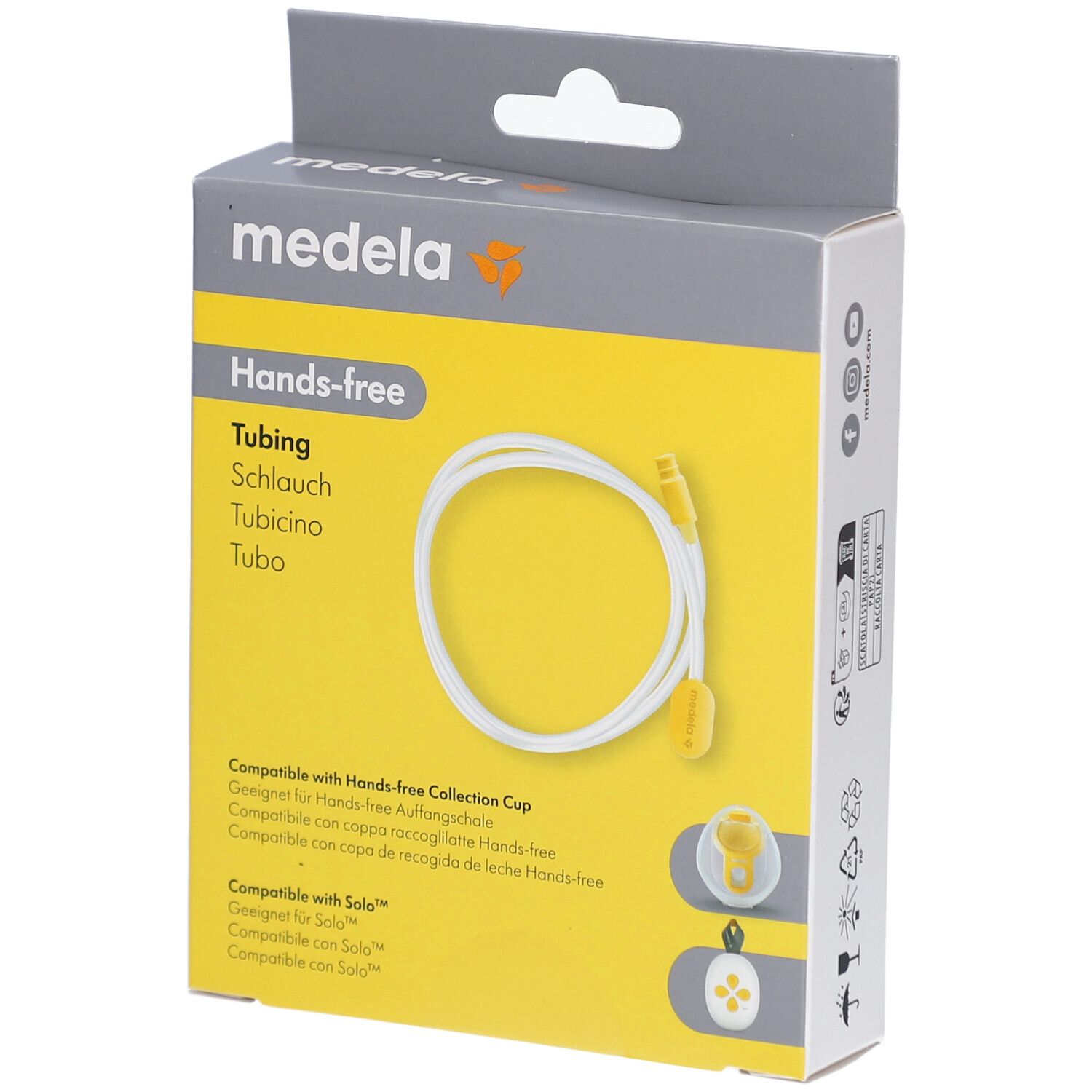 Verpackung mit Hands-free Tubing. Marke Medela. Gelber Hintergrund mit weißem Schlauch. Produktname und Logo sichtbar.
