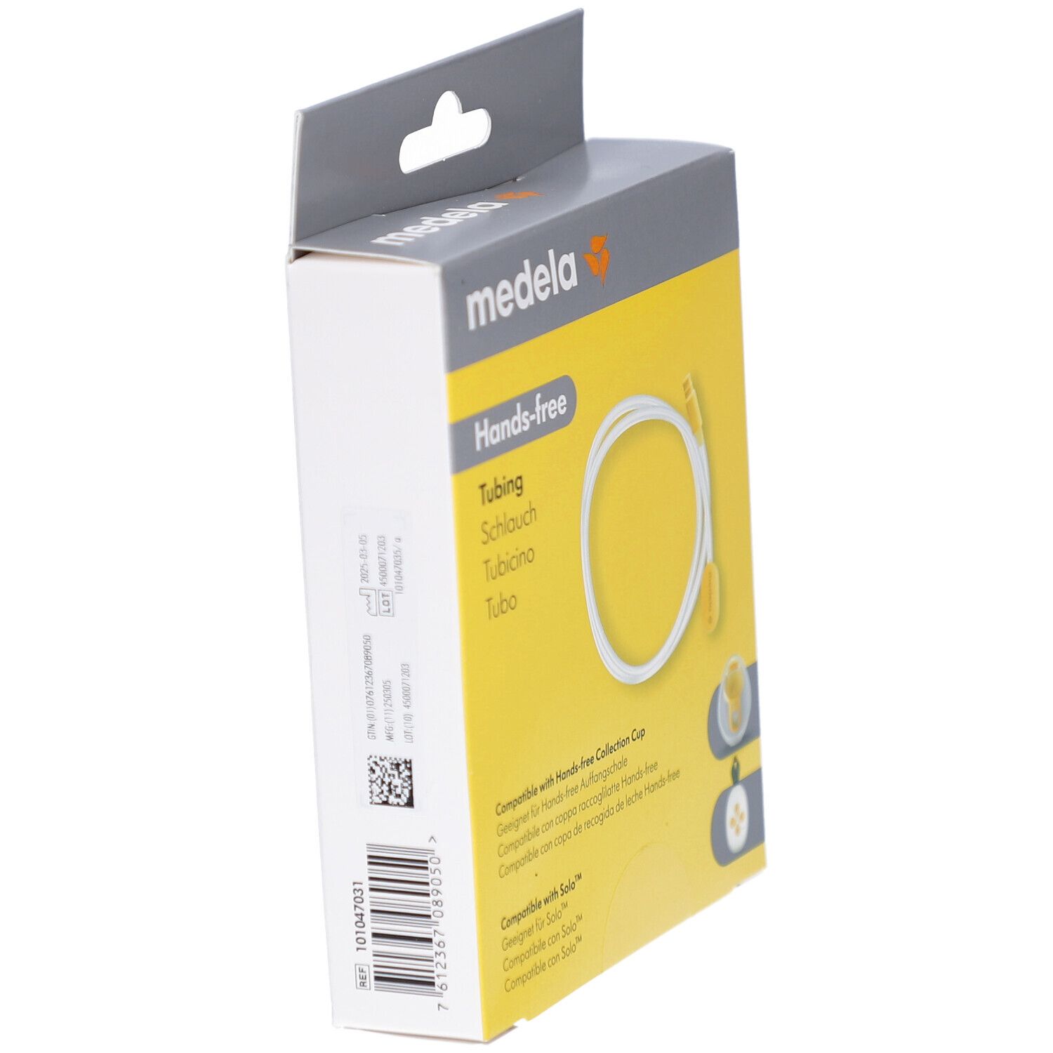 Seitenansicht der Verpackung. Hands-free Tubing. Marke Medela. Gelber Hintergrund. Produktname und Logo sichtbar.