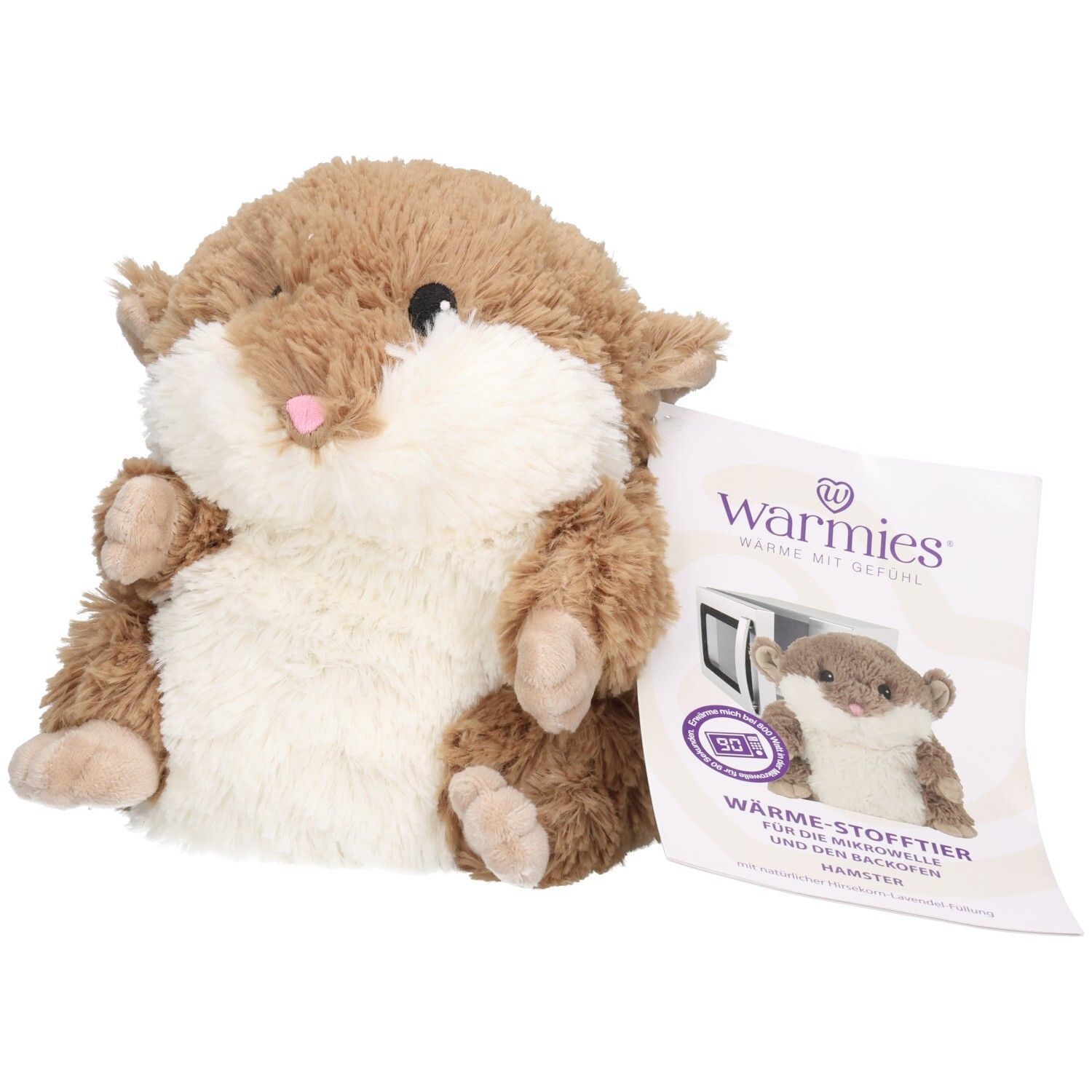 Braunes Hamster-Wärmekissen mit weißem Bauch und rosa Nase. Mit Produktetikett.