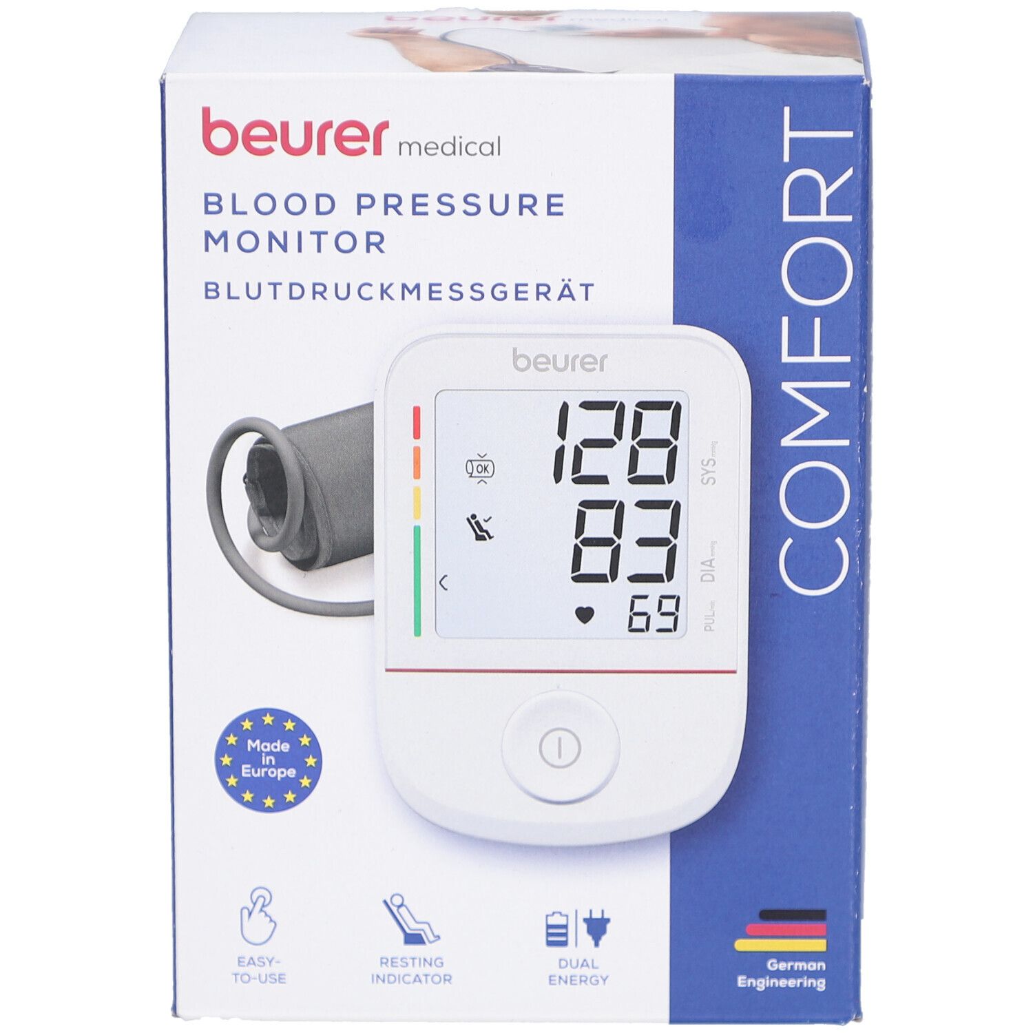 Blutdruckmessgerät in Verpackung. Anzeige: 128/83/69. Marke: beurer medical. Mit Manschette und Display. Made in Europe.
