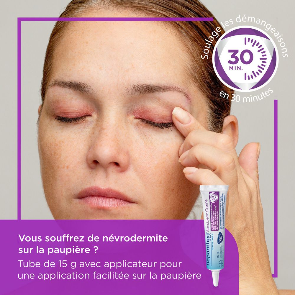 Femme appliquant de la crème sur la paupière. Bepanthen PRO Sensiderm Crème, tube de 15g. Soulage en 30 minutes.