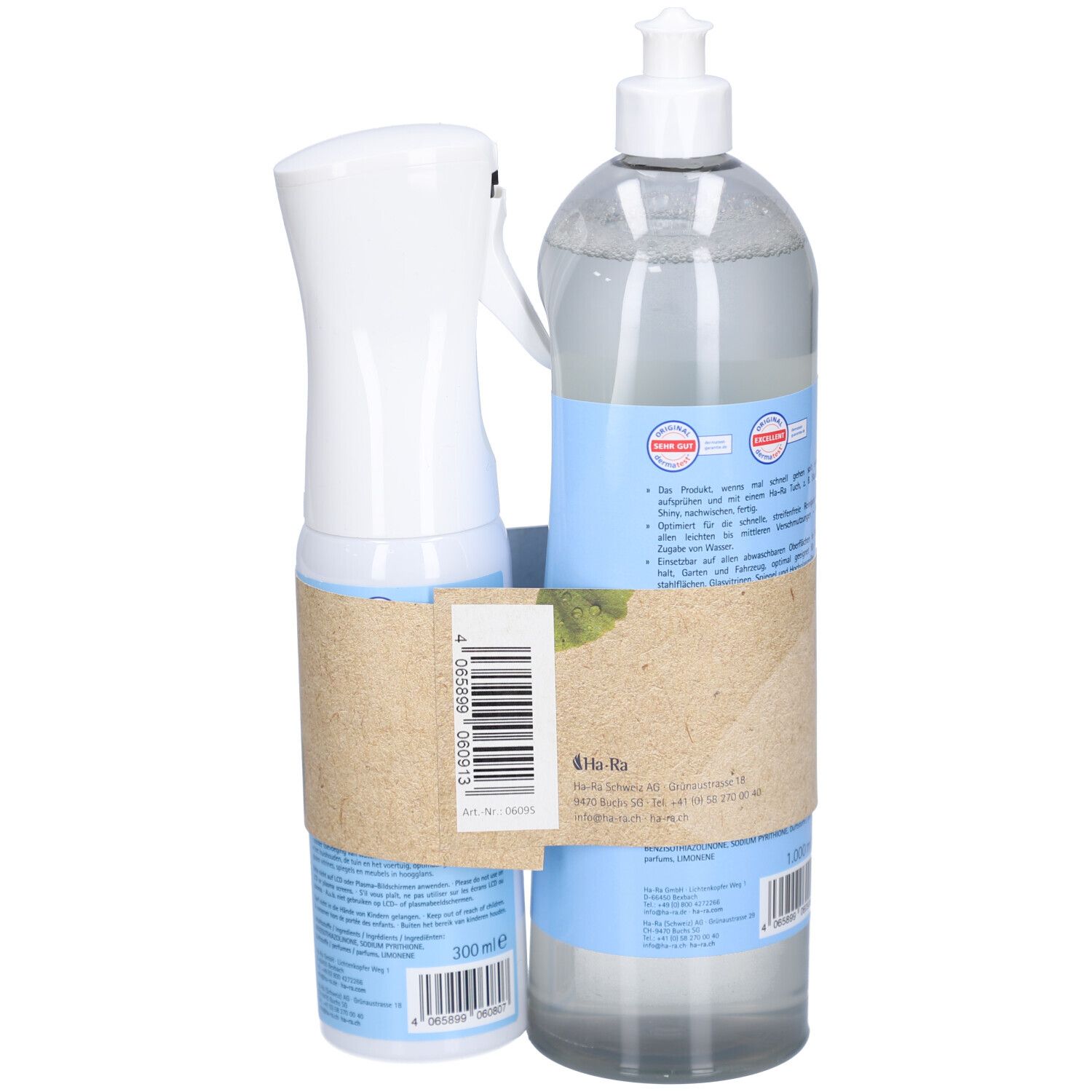 Set Glas- & Oberflächenreiniger. Zwei Flaschen, eine mit Sprühkopf, eine mit Schraubverschluss. Rückseite mit Etiketten und Barcode.