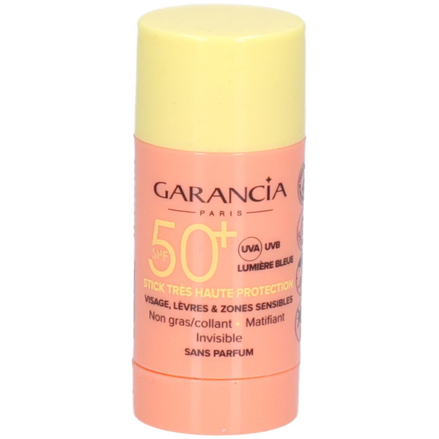 Sonnenschutz-Stick mit gelbem Deckel und rosafarbenem Behälter. Text: GARANCIA, SPF 50+, STICK TRES HAUTE PROTECTION.