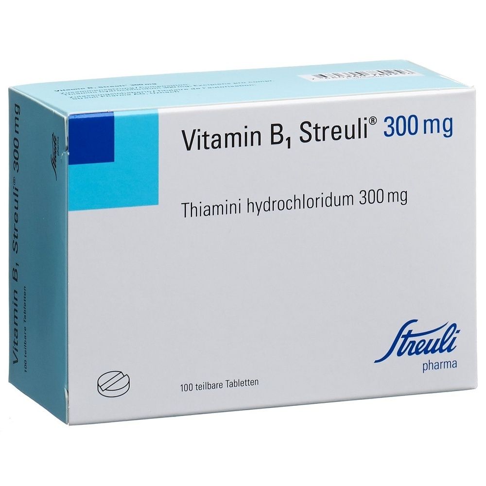 Schachtel mit Vitamin B1 Streuli 300 mg Tabletten. Aufschrift: Thiamini hydrochloridum 300 mg, 100 teilbare Tabletten. Logo Streuli pharma.
