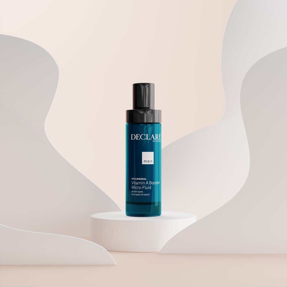 Flacon bleu avec bouchon noir sur socle blanc. Fond avec formes incurvées.