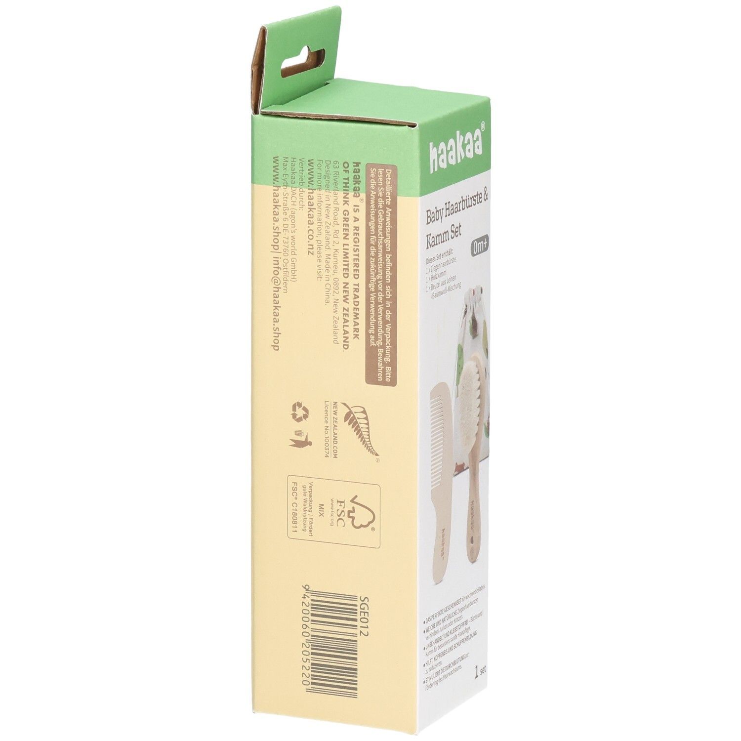 Arrière de l'emballage d'origine du set brosse et peigne Haakaa pour bébé avec informations produit et code-barres.