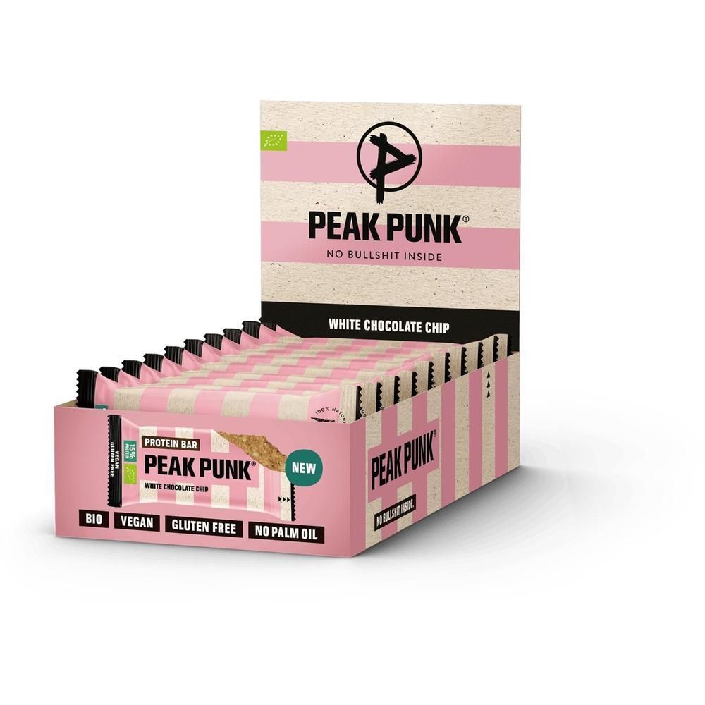 PEAK PUNK Bio Proteinriegel White Chocolate Chip in einer offenen Displaybox mit 12 einzeln verpackten Riegeln.