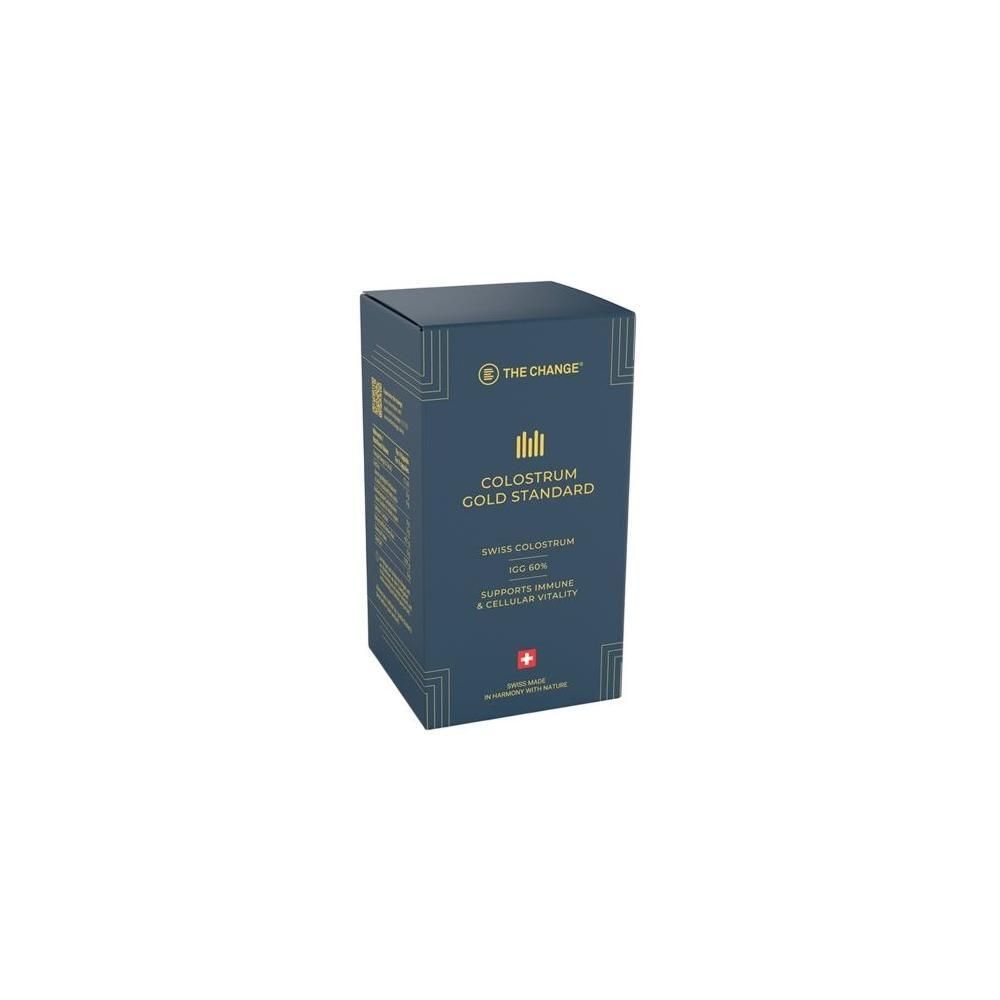 Verpackung von THE CHANGE Colostrum Gold Standard Kapseln, dunkelblau mit goldenen Akzenten.