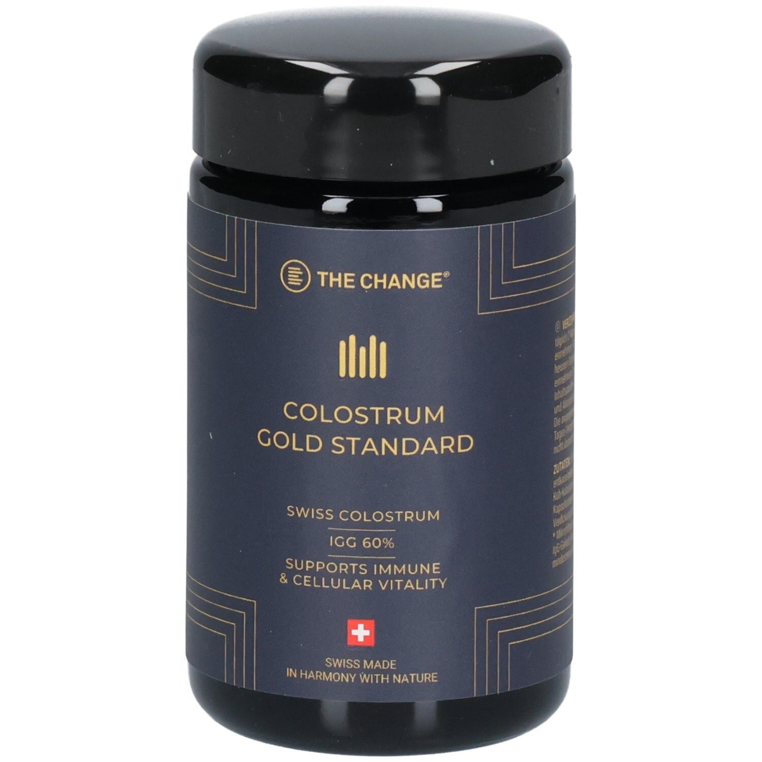 Dunkelblaues Glas mit schwarzem Deckel für THE CHANGE Colostrum Gold Standard.