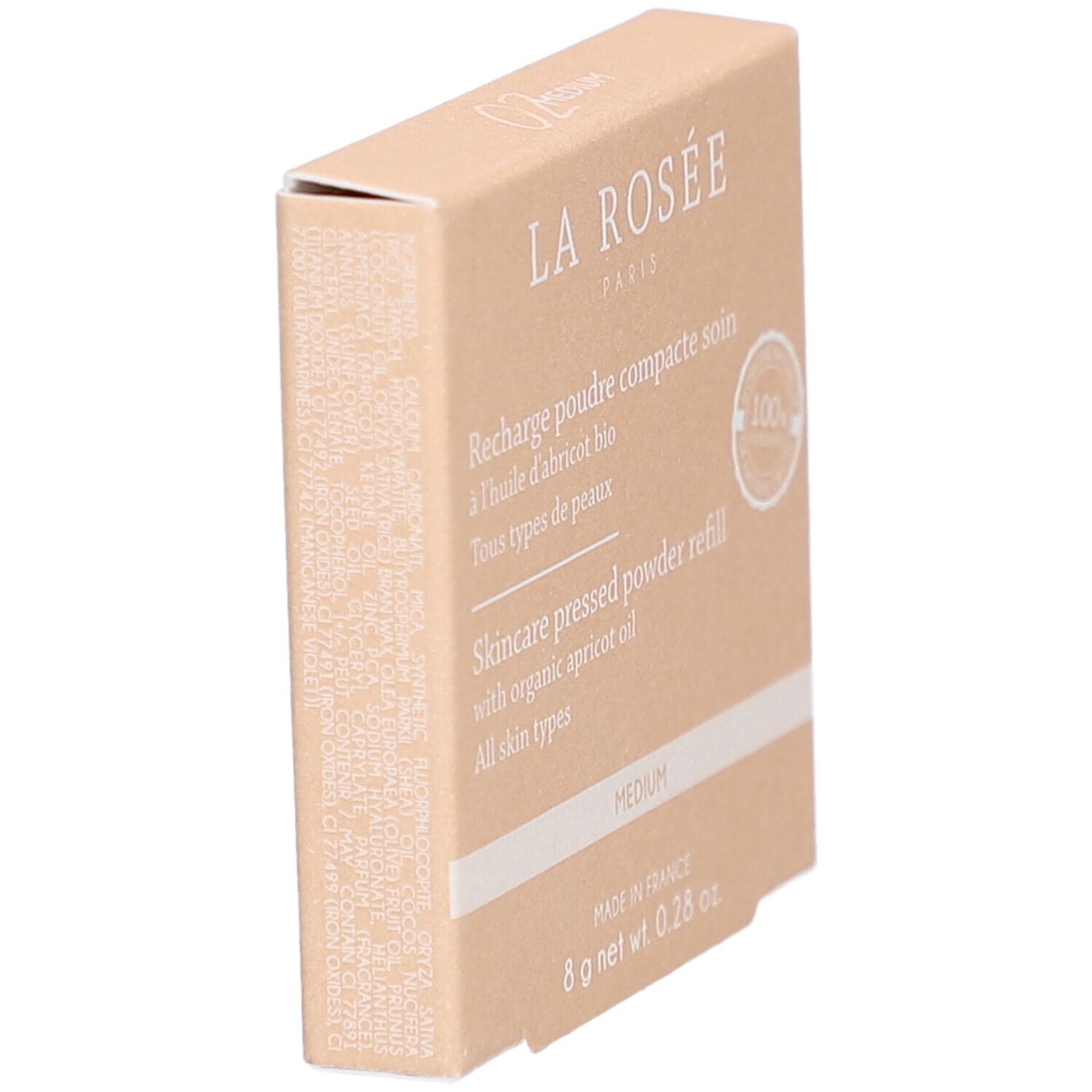 Kompaktpuder-Nachfüllung in Kartonverpackung. Marke La Rosée. Seitenansicht. Text: Recharge poudre compacte soin. Medium-Farbton.