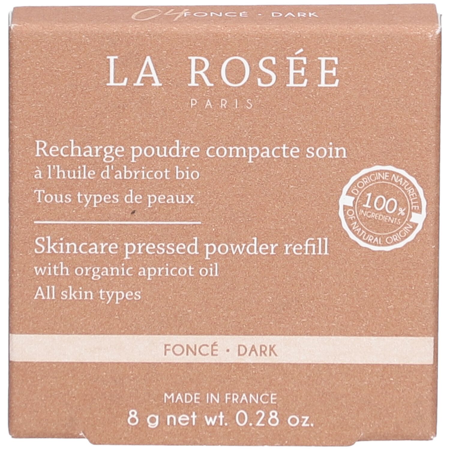 Kompaktpuder-Nachfüllung in brauner Kartonverpackung. Aufschrift: La Rosée, Pflege Dunkel. 8 g.