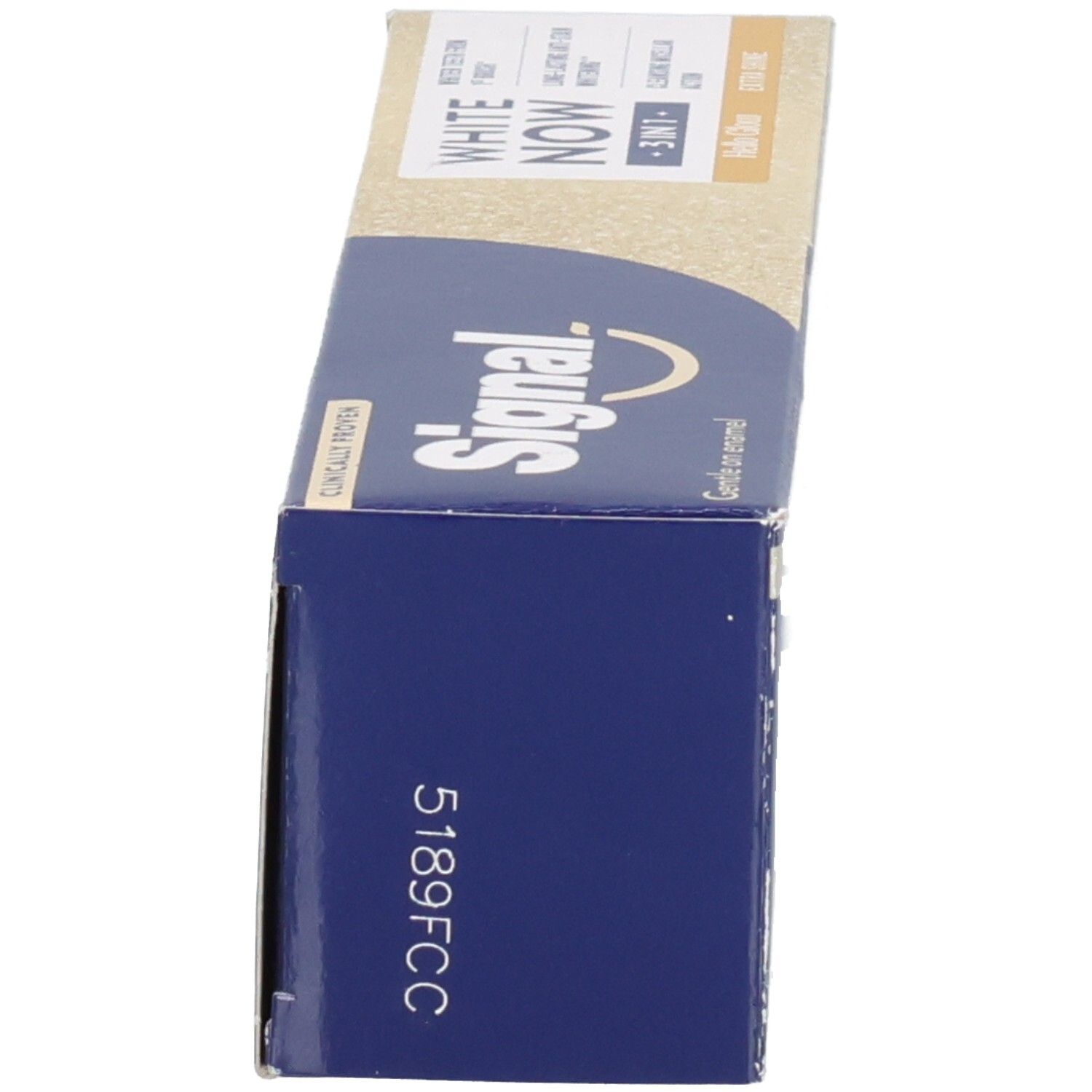 Boîte de dentifrice, vue latérale. Inscription: Signal. Couleurs bleu et beige.