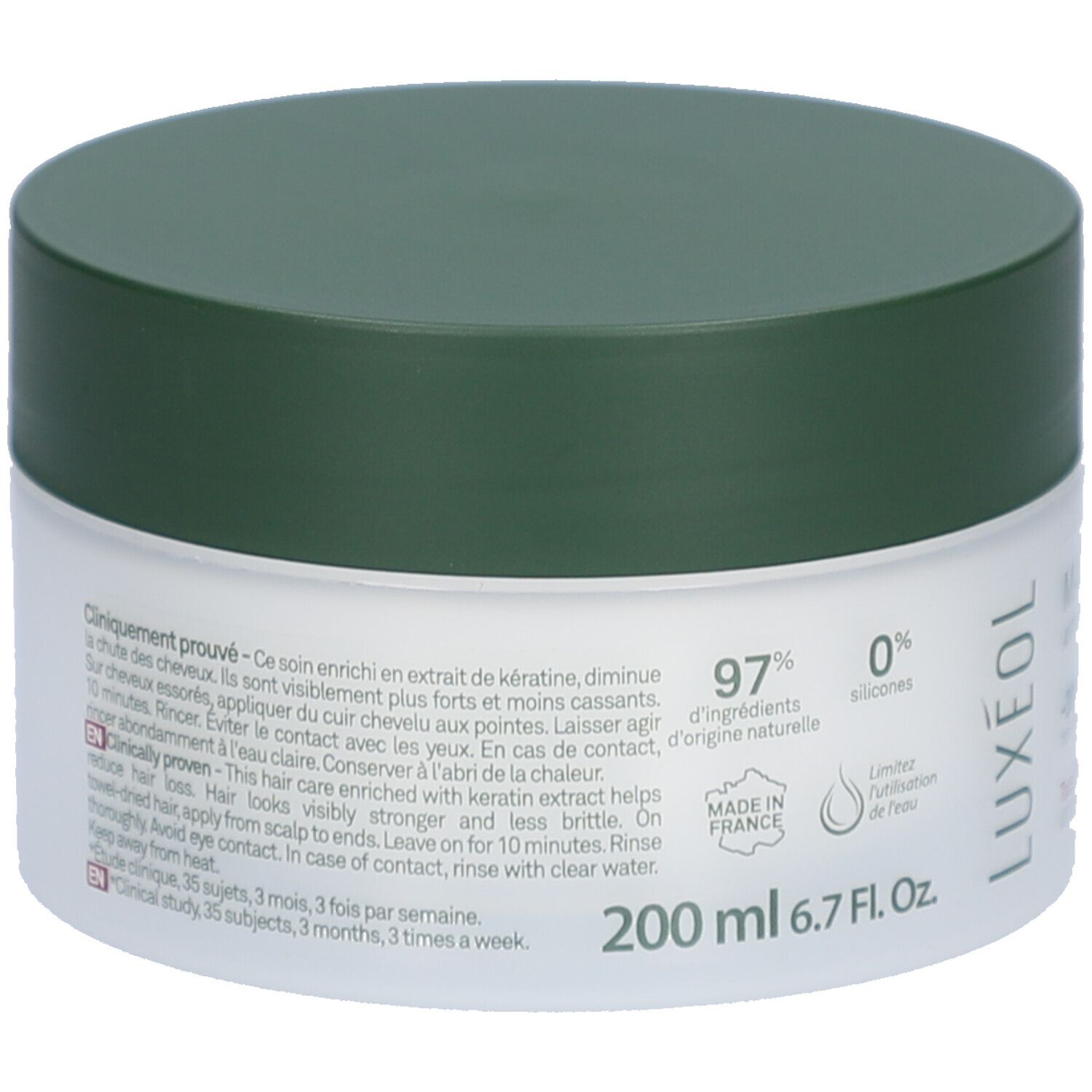 Runde Dose mit grünem Deckel. Text: Klinisch erwiesen. Enthält 97% natürliche Inhaltsstoffe und 0% Silikone. 200 ml.