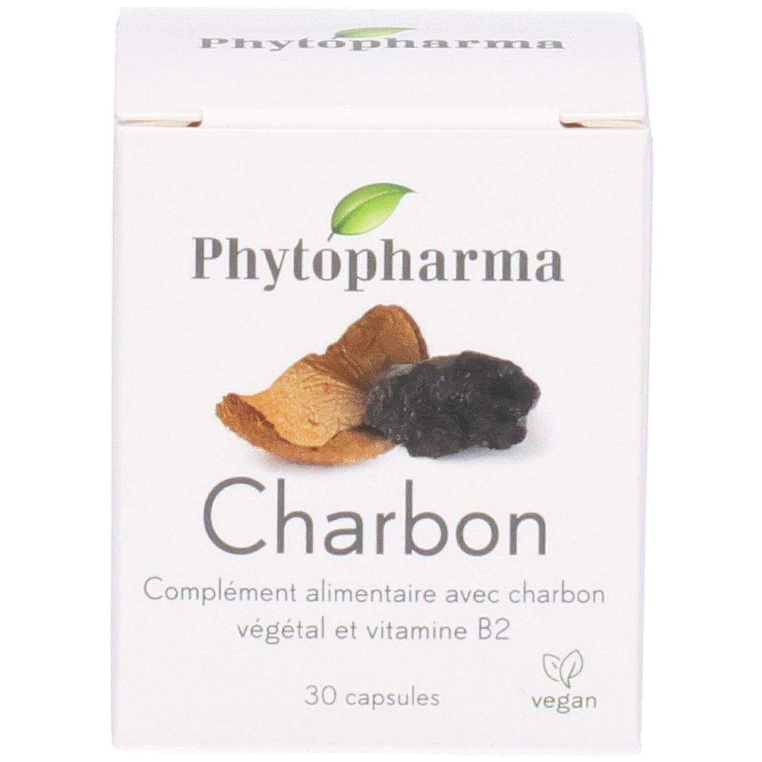 Schachtel für Pflanzenkohle und Vitamin B2 Kapseln, zeigt das Phytopharma Logo und Pflanzenkohle-Stücke.