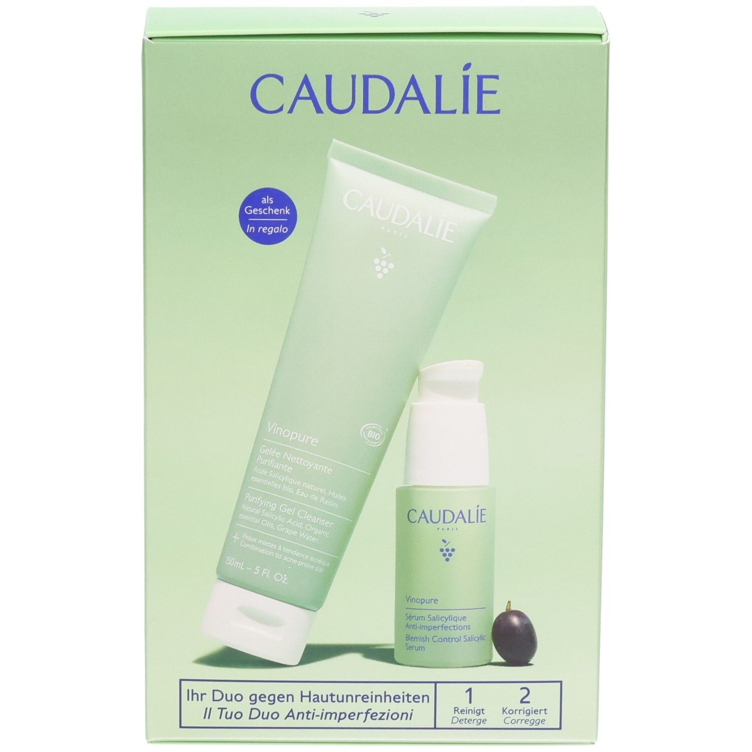 Grüne Verpackung mit zwei Produkten: Reinigungs-Gel und Serum. Caudalie-Logo und Produktnamen sind sichtbar.