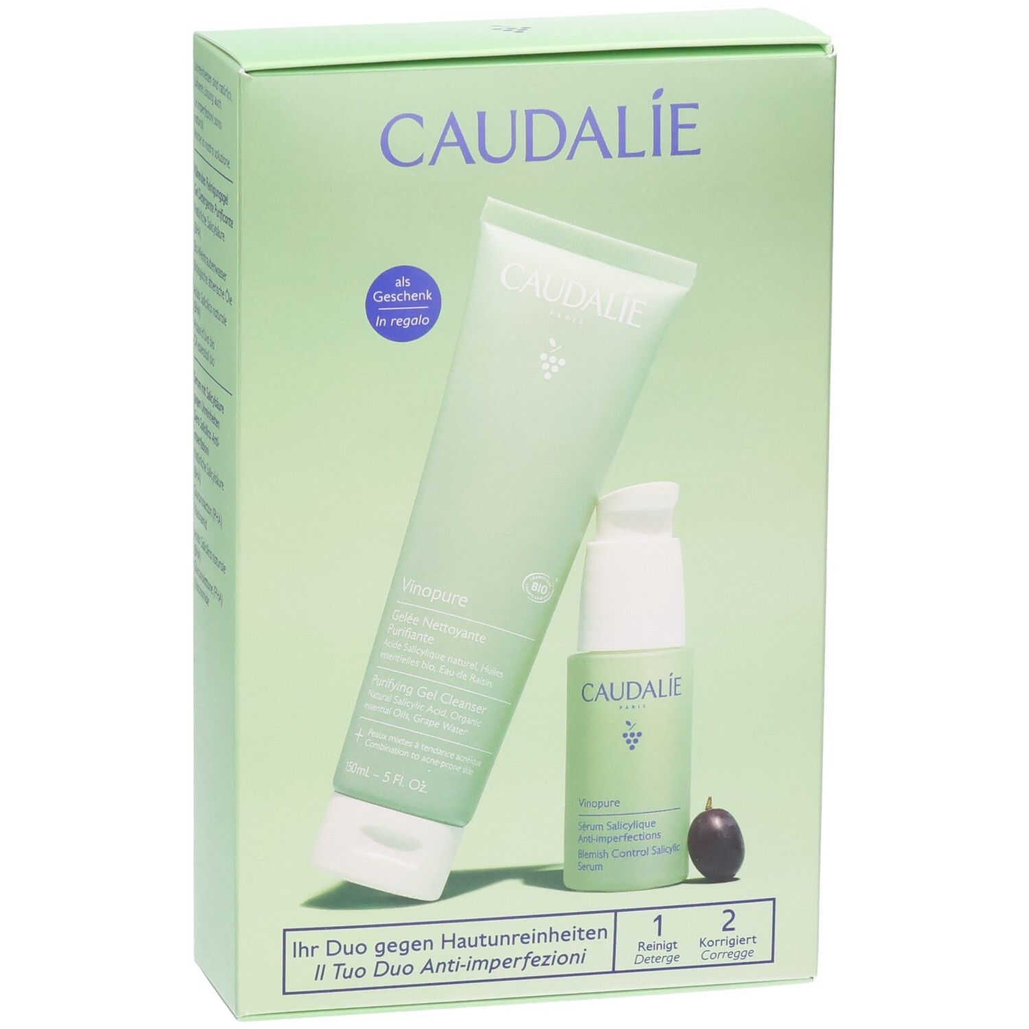 Grüne Verpackung mit zwei Produkten: Reinigungs-Gel und Serum. Caudalie-Logo und Produktnamen sind sichtbar.