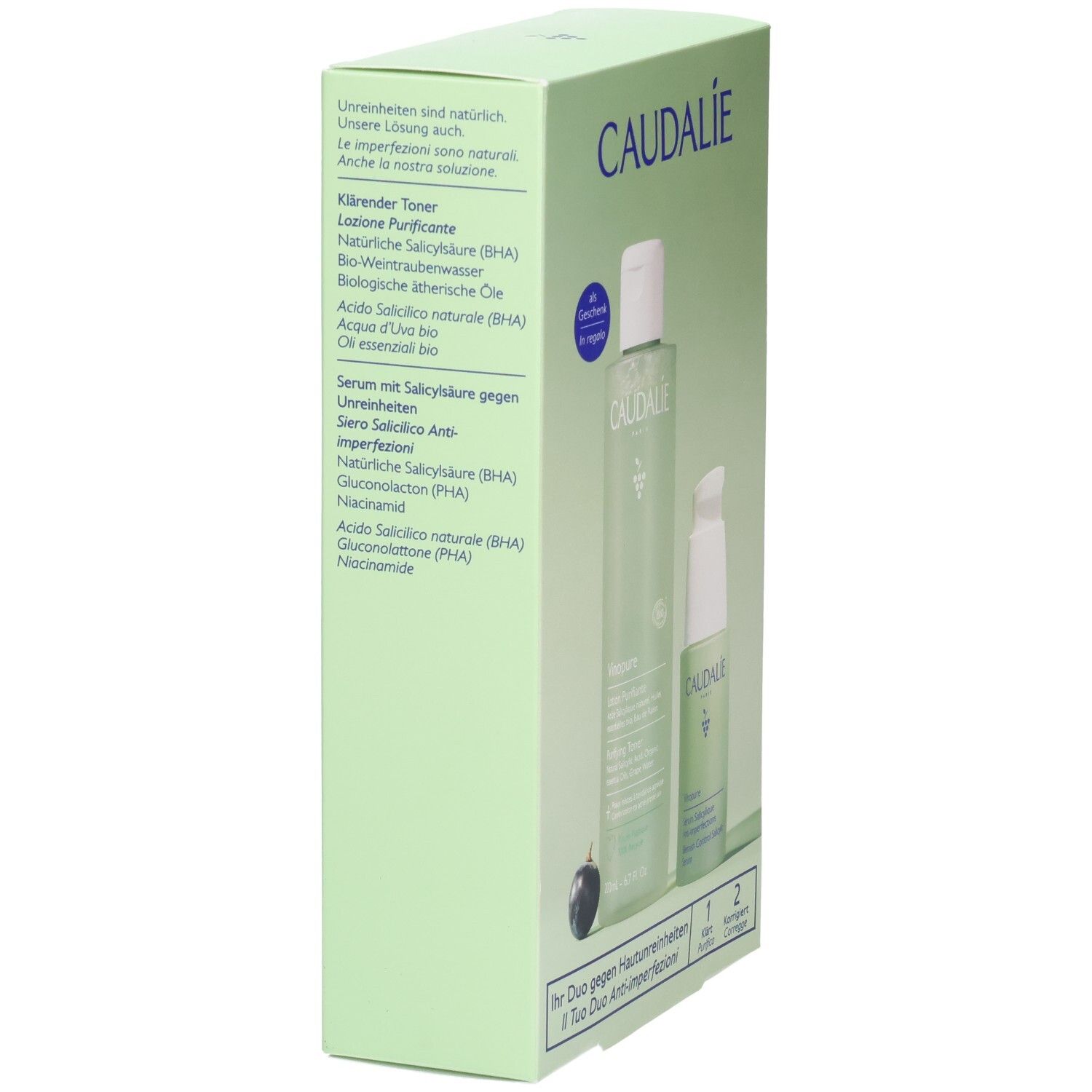 Grüne Box, Seite mit Text. Caudalie-Logo. Auflistung der Inhaltsstoffe. Text: Klärender Toner, Serum mit Salicylsäure gegen Unreinheiten.