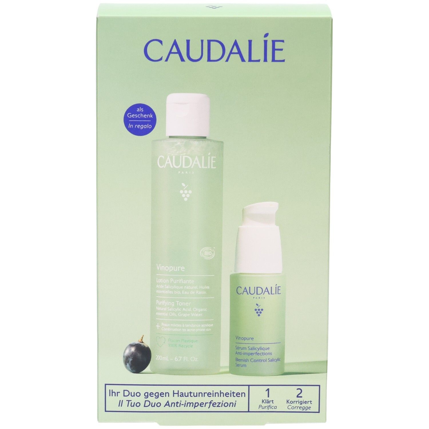 Grüne Geschenkbox mit zwei Produkten. Caudalie-Logo. Flasche und Serumflasche. Text: Vinopure, Ihr Duo gegen Hautunreinheiten.