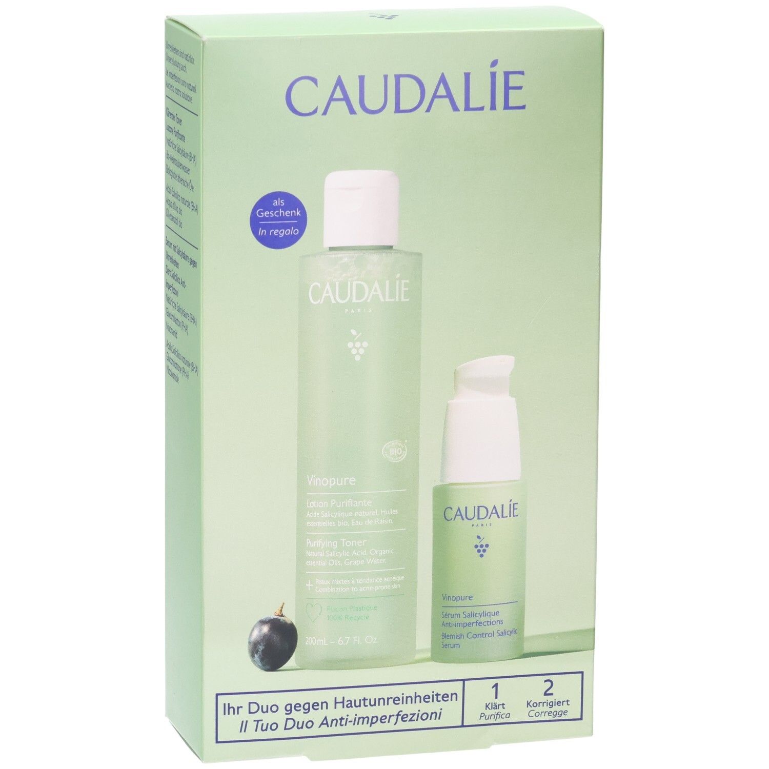 Grüne Geschenkbox mit zwei Produkten. Caudalie-Logo. Flasche und Serumflasche. Text: Vinopure, Ihr Duo gegen Hautunreinheiten.