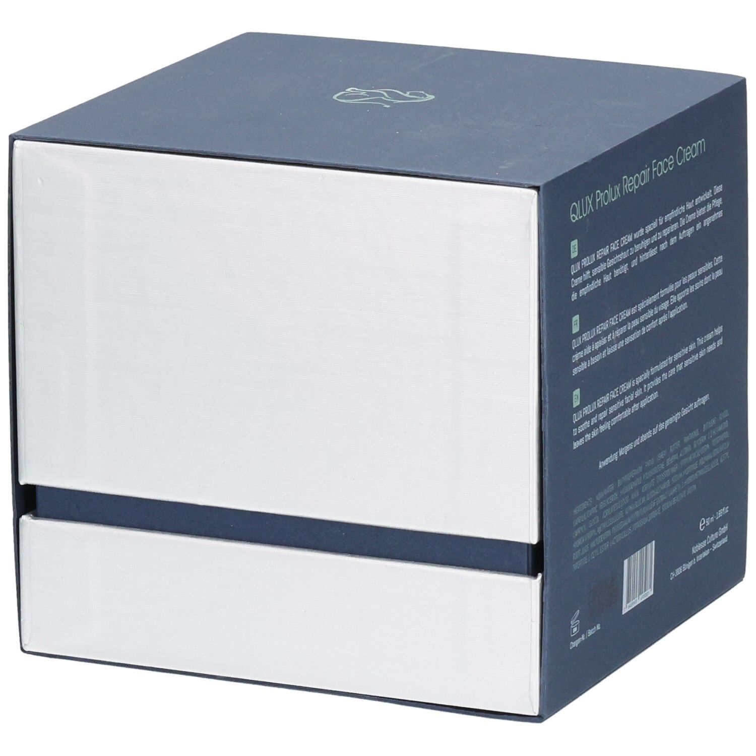 Dunkelblaue quadratische Verpackung mit silbernen Seiten. QLUX Prolux Repair Face Cream. Schweizer Kreuz. Sichtfenster.