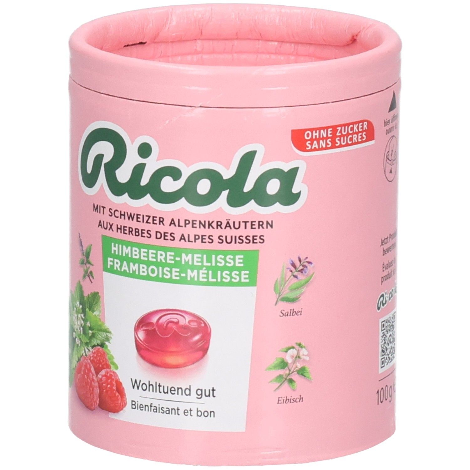 Ricola Himbeer-Melisse Bonbondose, rosa, mit Kräuterabbildungen, Bonbon und "Ohne Zucker" Aufdruck.