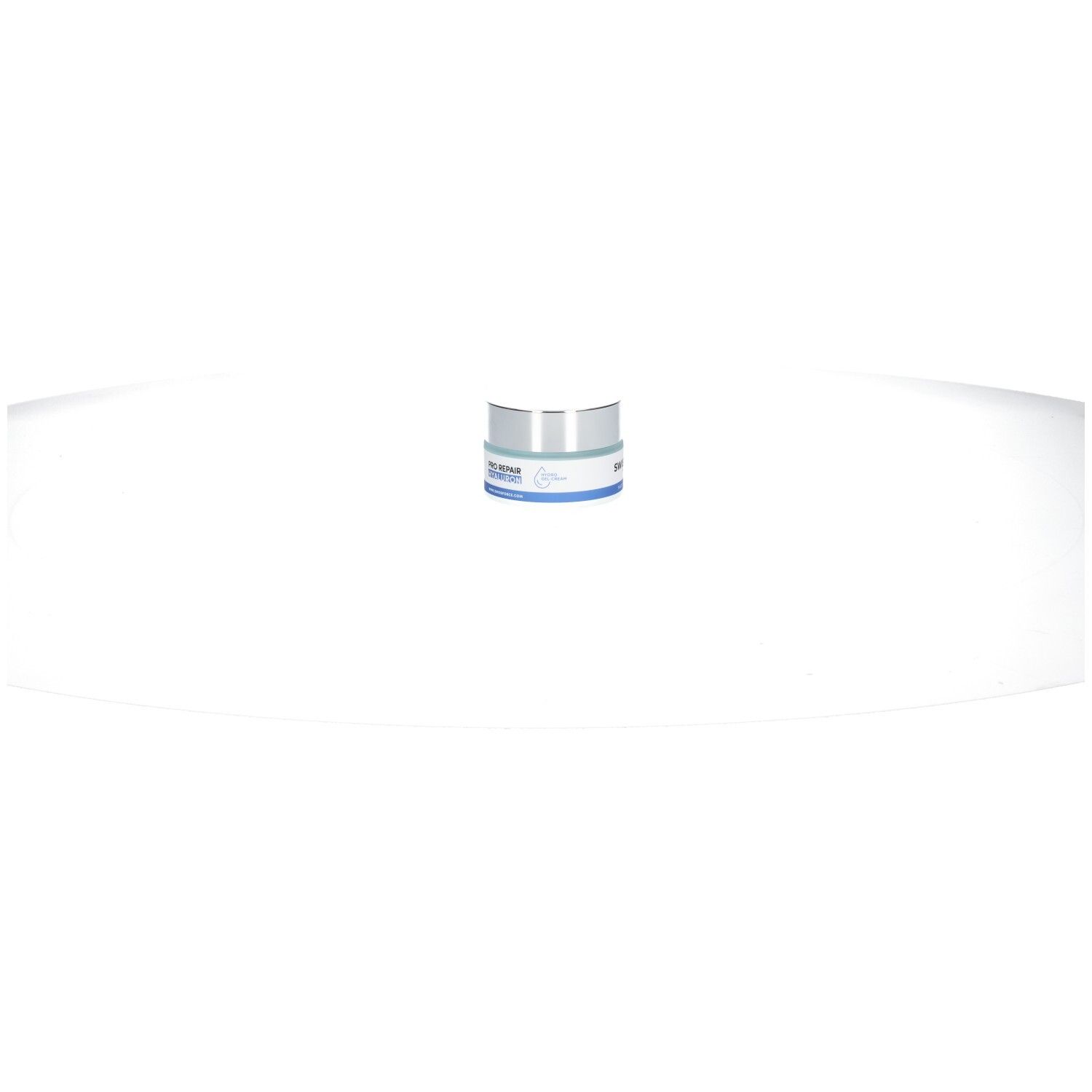 Creme-Tiegel mit silbernem Deckel und blauem Streifen. Text: SWISSFORCE, Made in Switzerland.