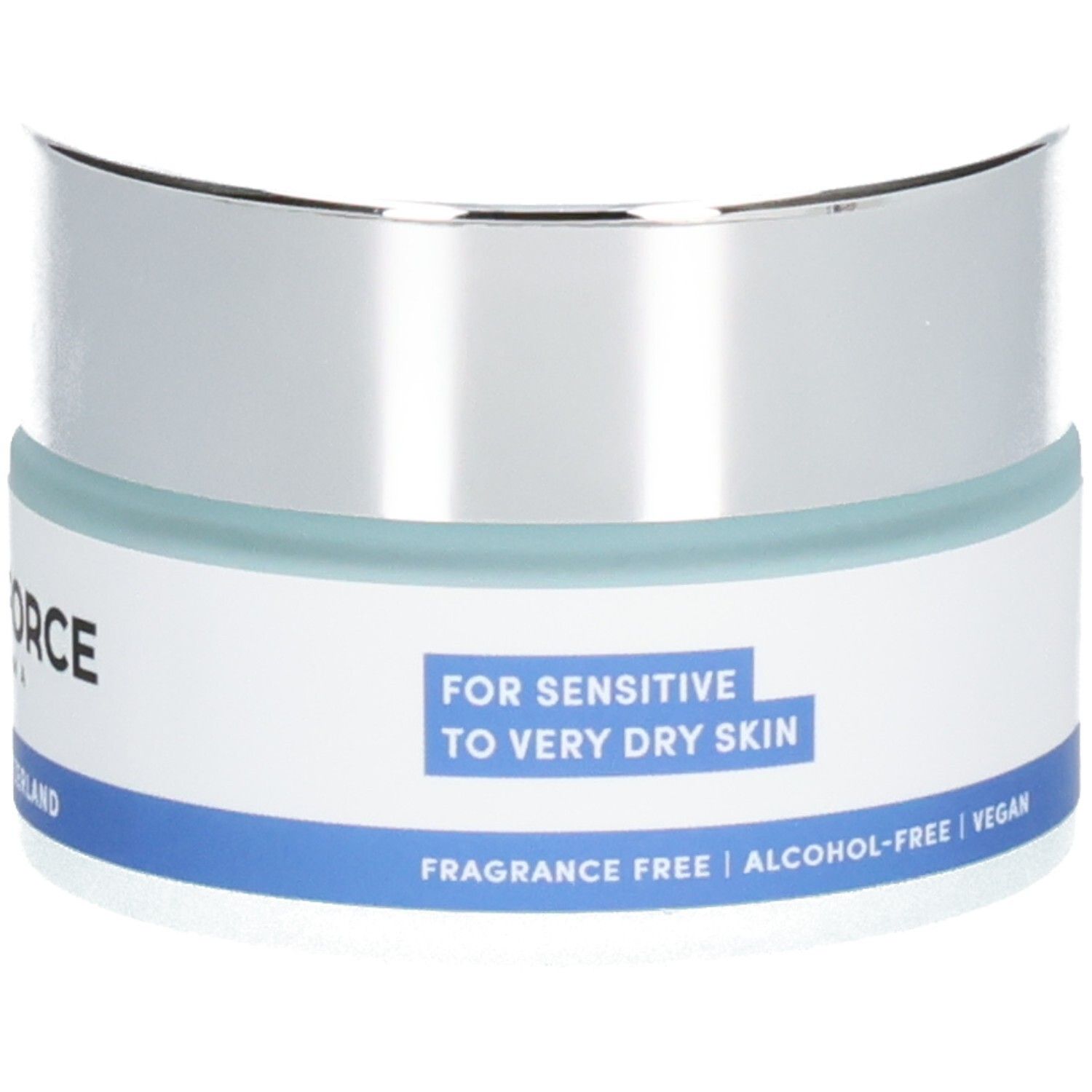 Creme-Tiegel mit silbernem Deckel und blauem Streifen. Text: Für empfindliche bis sehr trockene Haut, vegan.