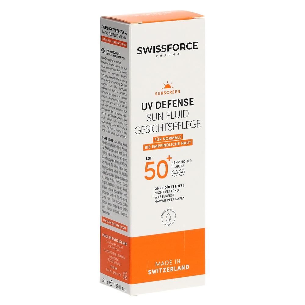 Weiß-orange Verpackung. Text: UV Defense Sun Fluid Gesichtspflege LSF 50+. Für normale bis empfindliche Haut. Made in Switzerland.