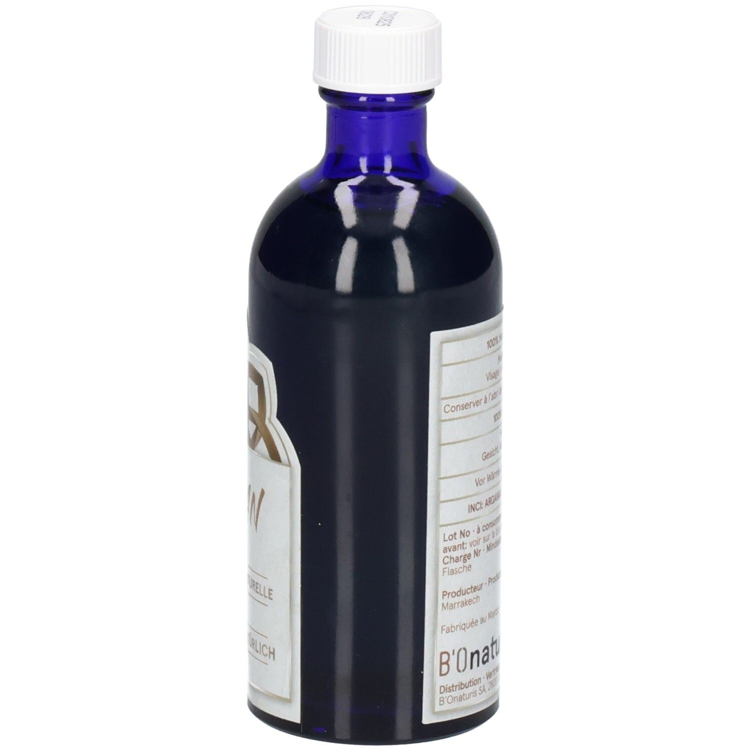 Seitenansicht einer dunkelblauen Glasflasche mit Etikett, das Produktinformationen enthält.