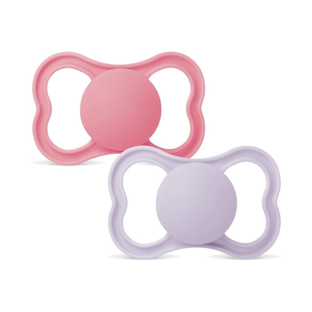Zwei MAM Supreme Silikon-Nuggis in Rosa und Lila für 16-36 Monate.