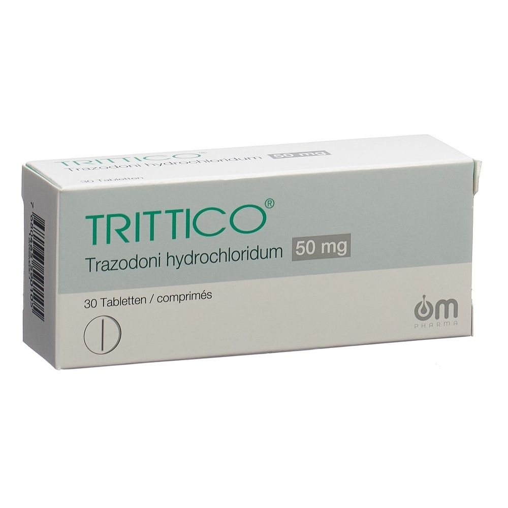 Kartonverpackung mit Produktnamen TRITTICO. Text in Grün und Schwarz. Rechteckige Form, weißer Hintergrund.