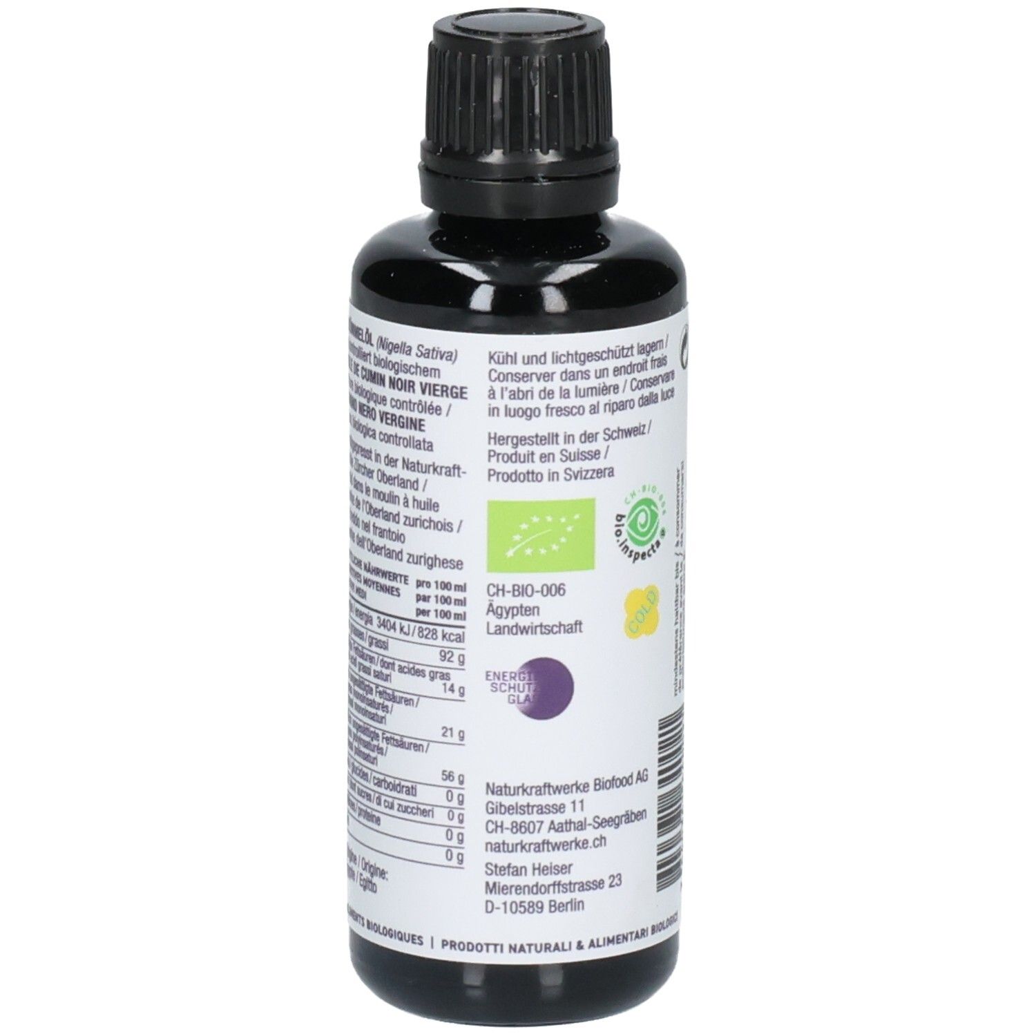 Arrière d'une bouteille de 50ml d'huile de cumin noir. Étiquette violette avec informations nutritionnelles détaillées et sceau bio.