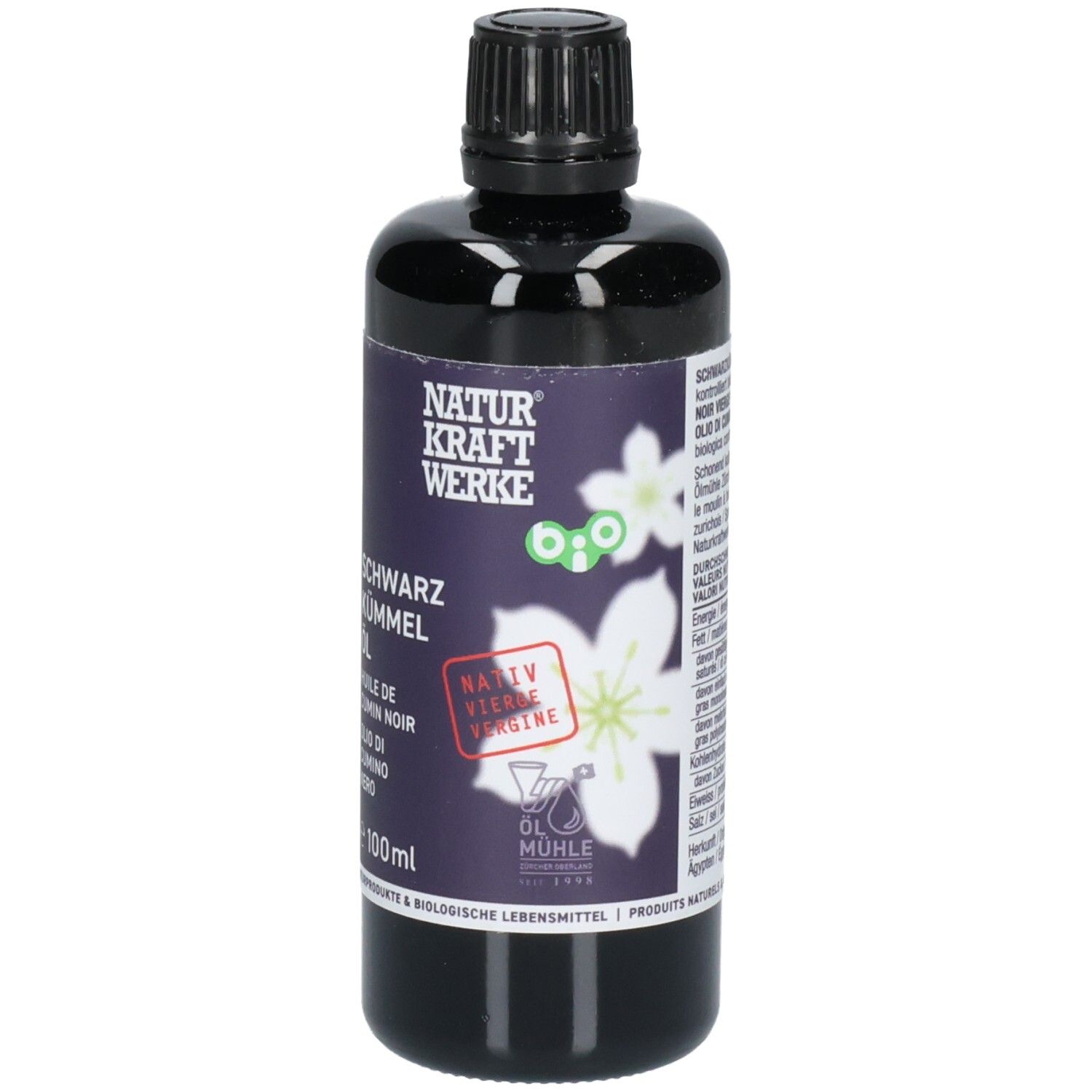 Huile de cumin noir dans une bouteille noire avec étiquette montrant des fleurs et un sceau bio, 100ml.
