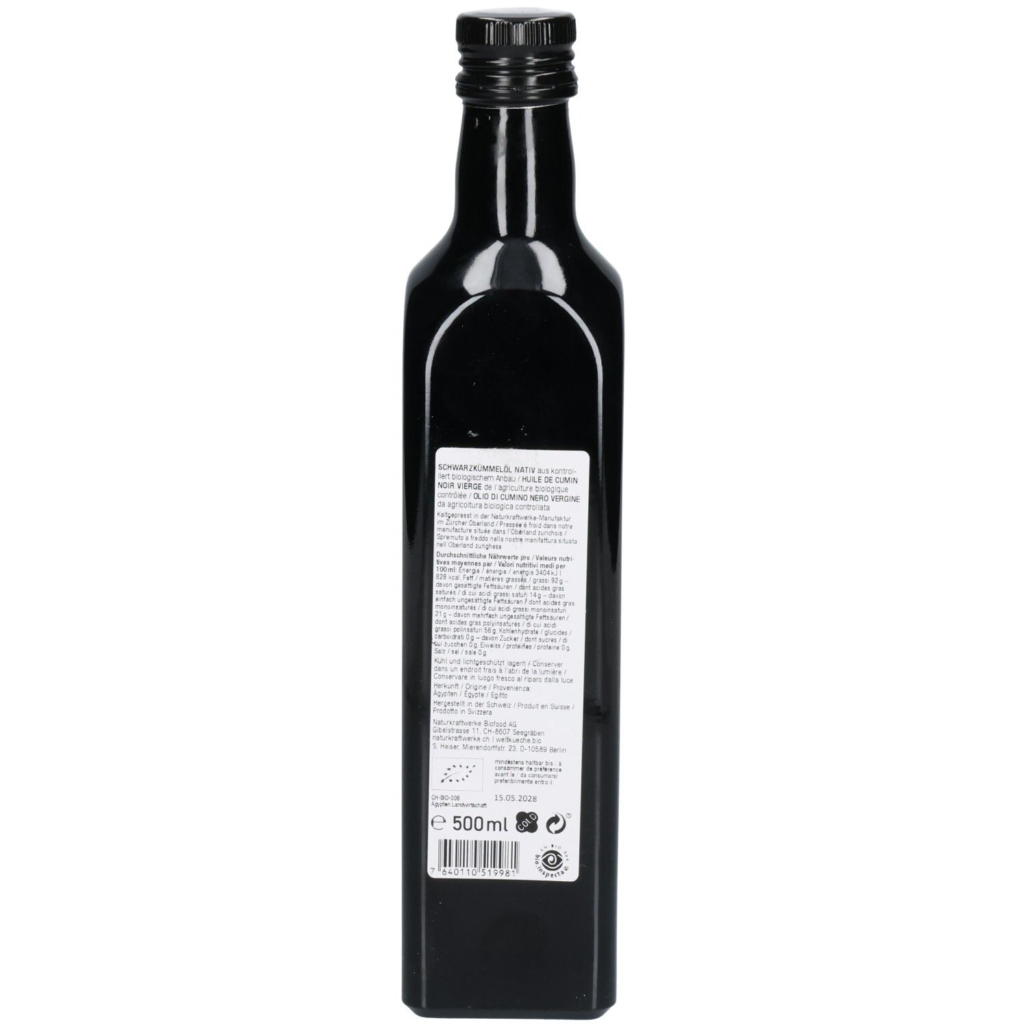 Arrière d'une bouteille d'huile de cumin noir avec informations nutritionnelles et label bio.