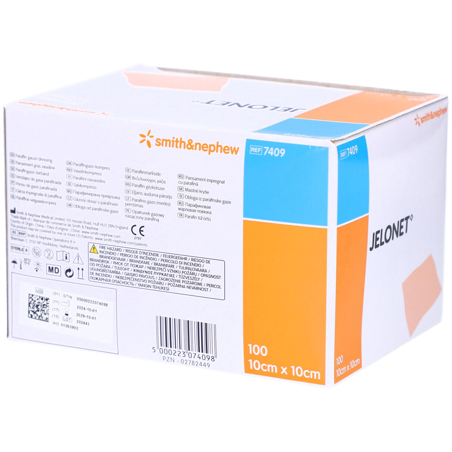 Boîte de compresses de gaze JELONET. Nom, logo et texte du produit. 100 pièces, 10cm x 10cm. Informations multilingues.