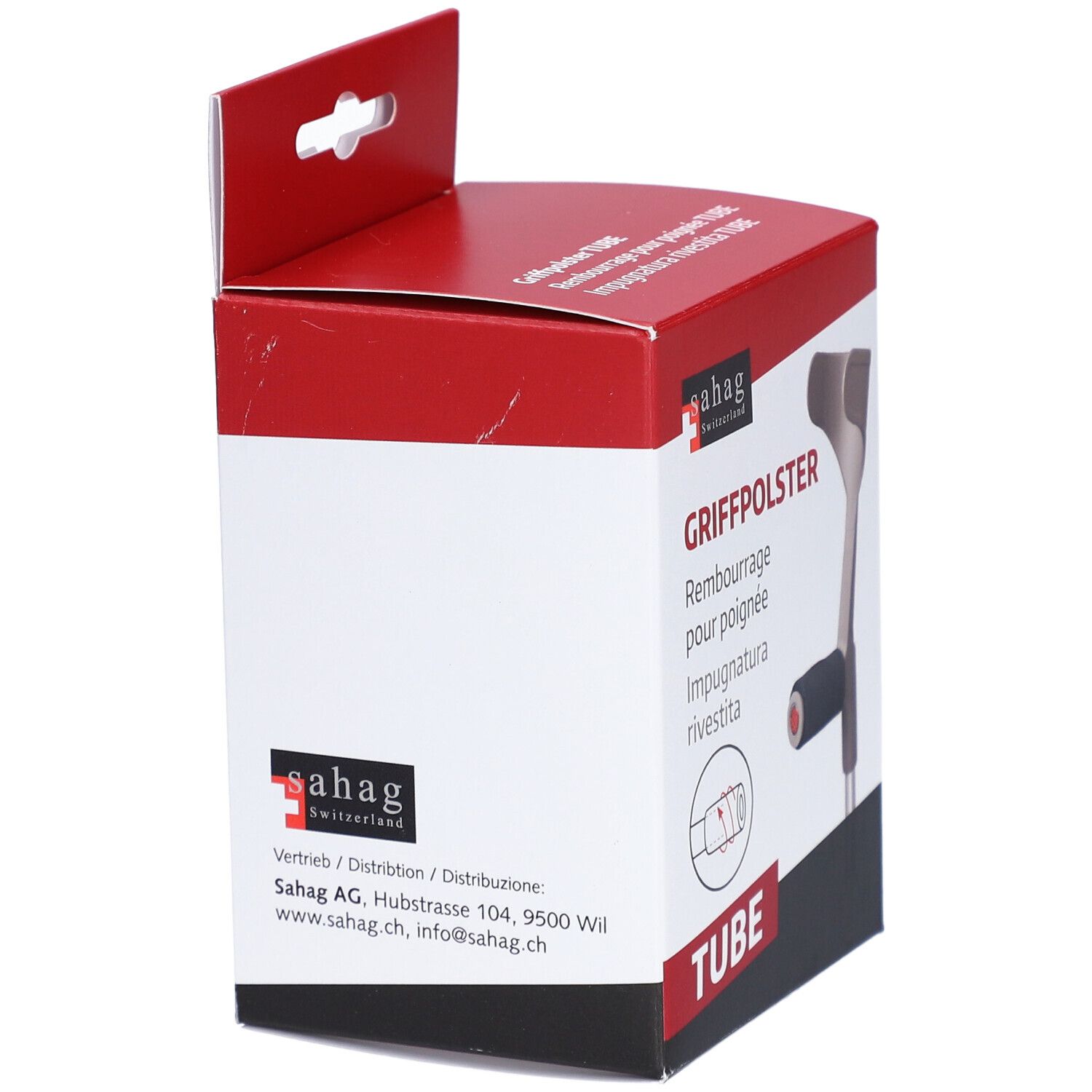 Verpackung mit Griffpolster für Krücken. Rote und weiße Box mit Logo und Text. Marke: sahag.