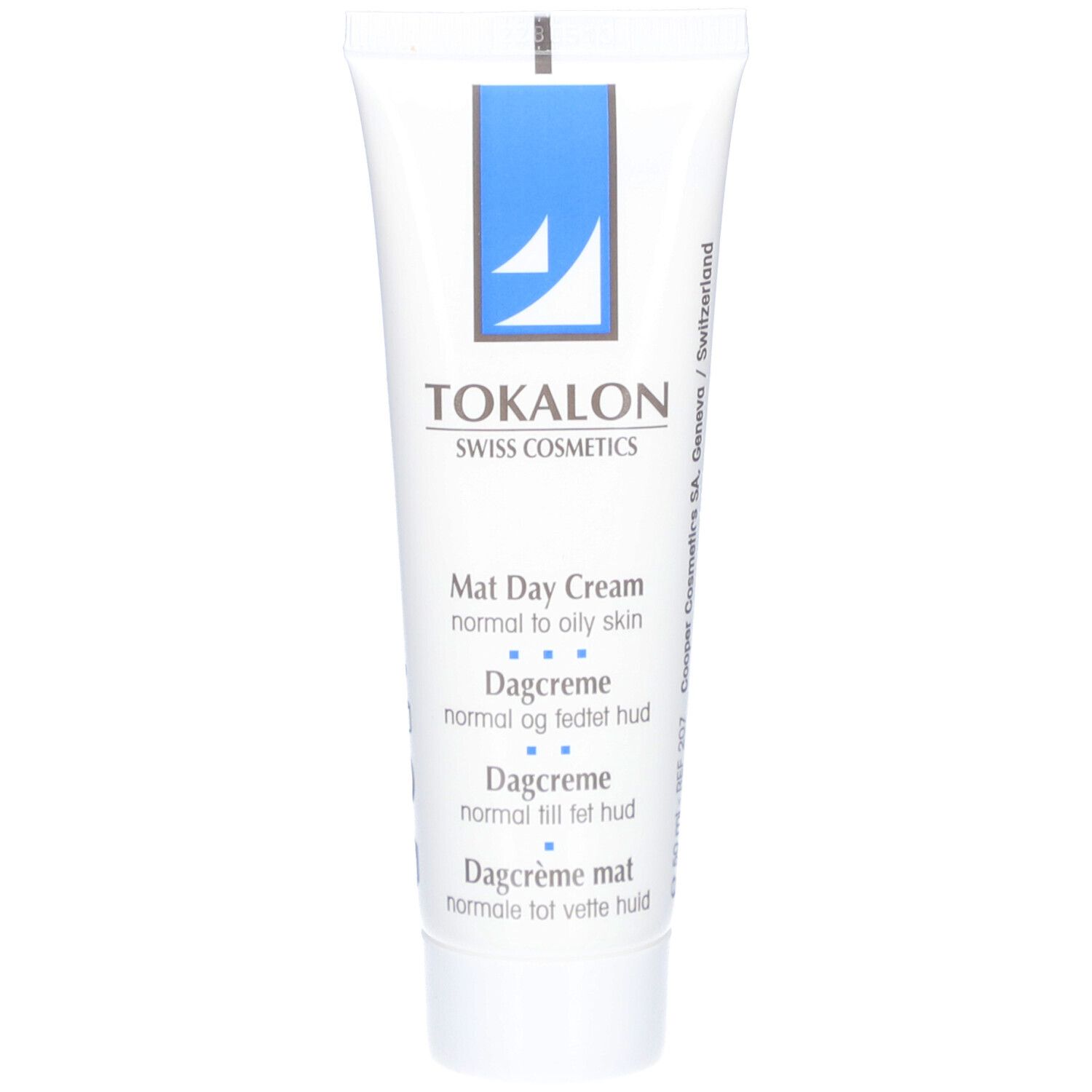 Tube blanc avec graphique bleu et texte TOKALON. Nom du produit : Mat Day Cream. Pour peaux normales à grasses.