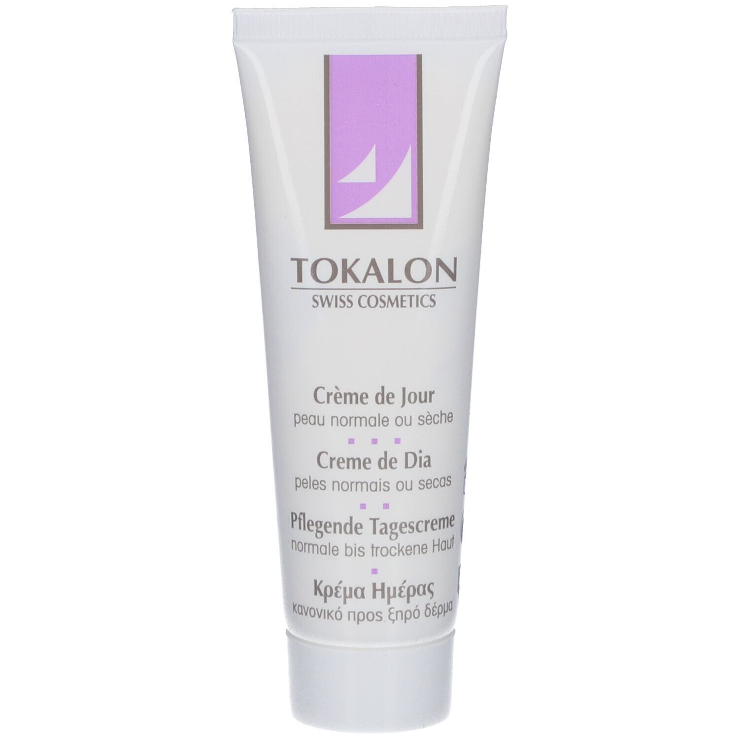 Tube blanc avec accents violets. Texte: TOKALON, Crème de Jour, pour peaux normales à sèches. Produit cosmétique.