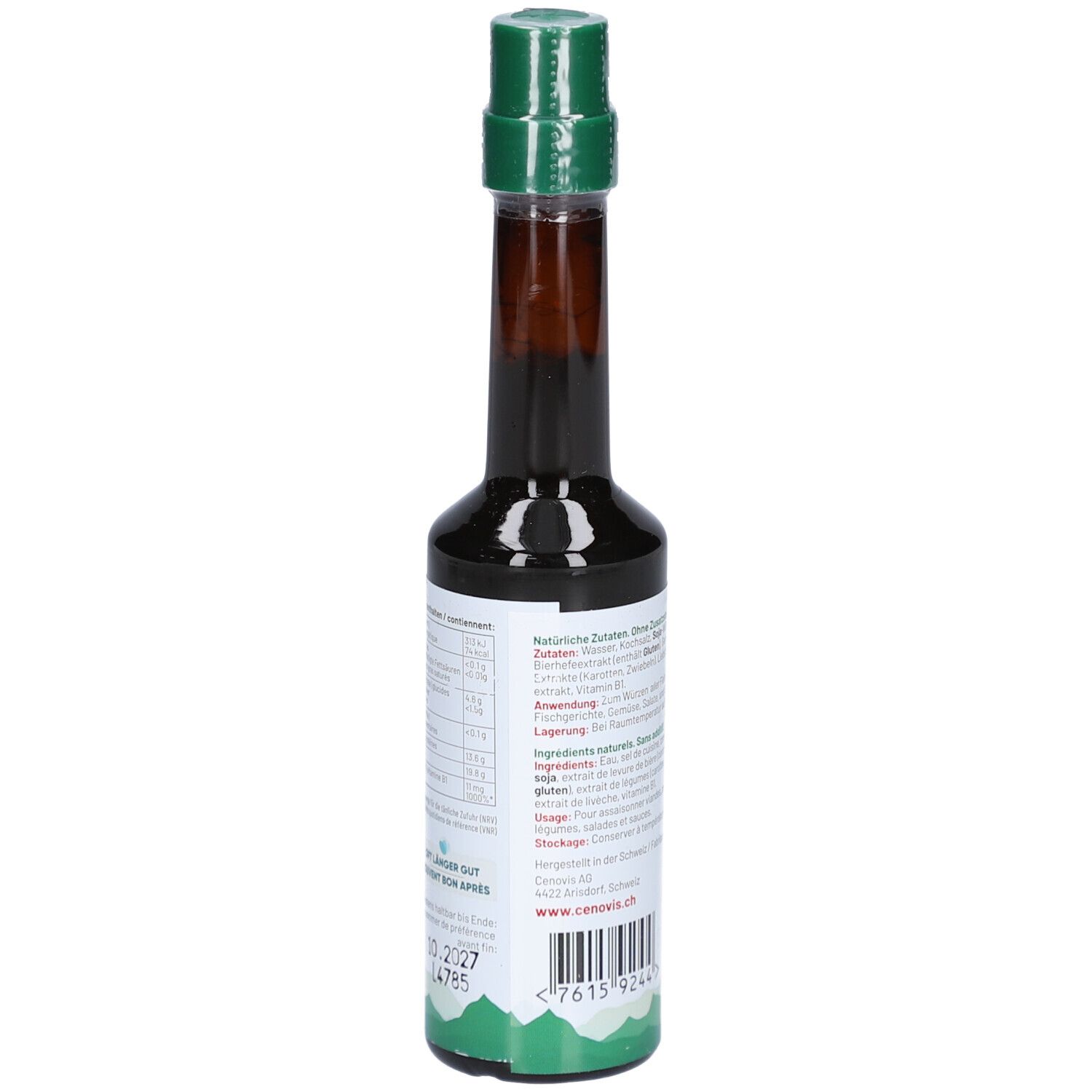 Braune Flasche mit grünem Deckel. Rückseite mit Text. Nährwertangaben. Mindesthaltbarkeitsdatum.