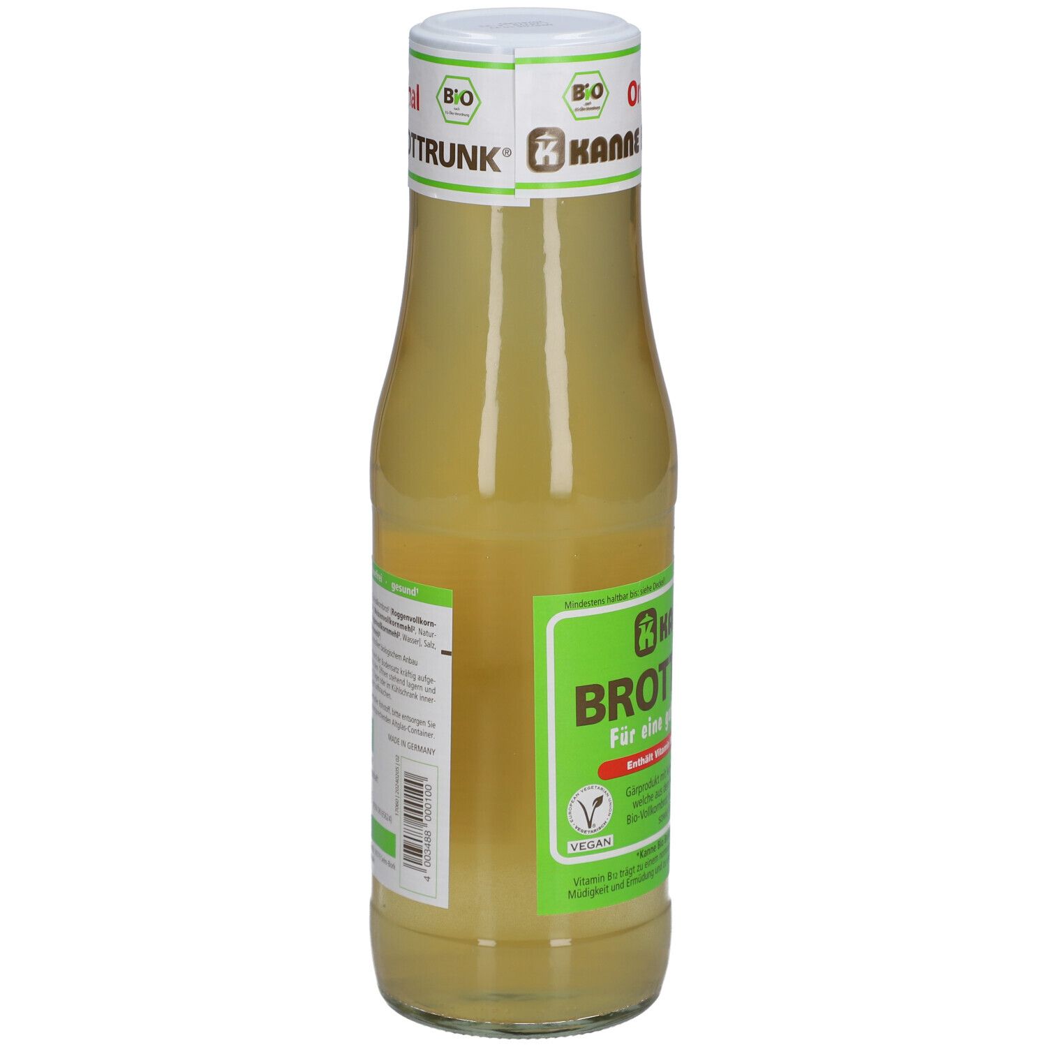 Rückseite der Glasflasche mit gelblicher Flüssigkeit. Aufschrift: KANNE BROTTRUNK, Vegan-Siegel.