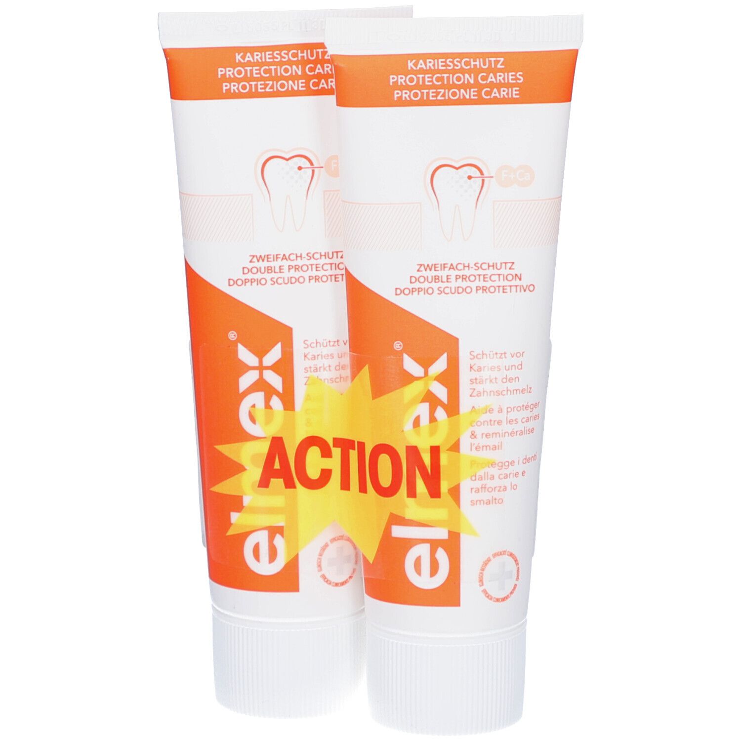 Deux tubes de dentifrice. Emballage orange et blanc avec nom du produit et symbole de dent. Inscription "ACTION".
